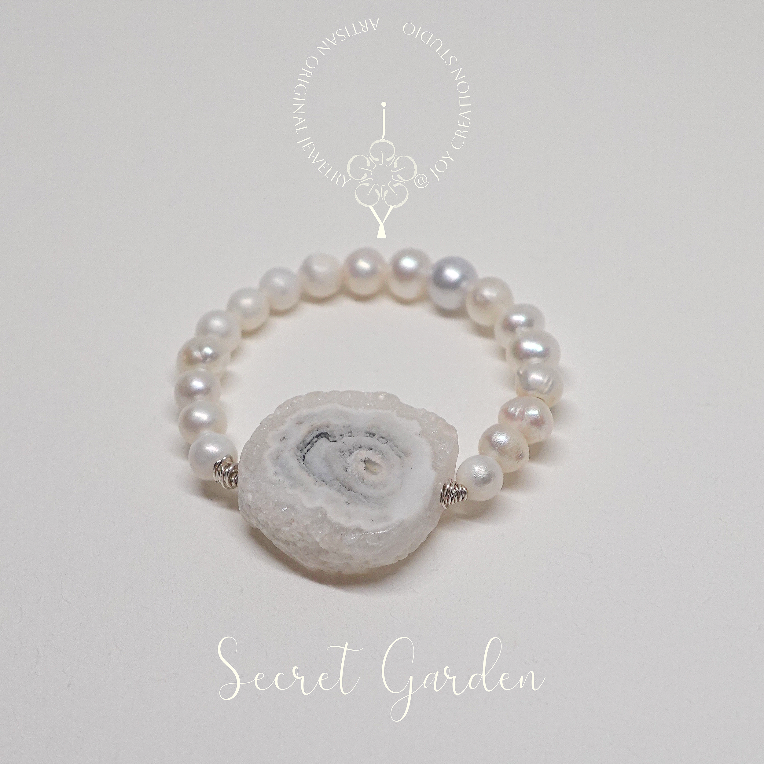 Secret+Garden+Ring+8a+with+logo.png