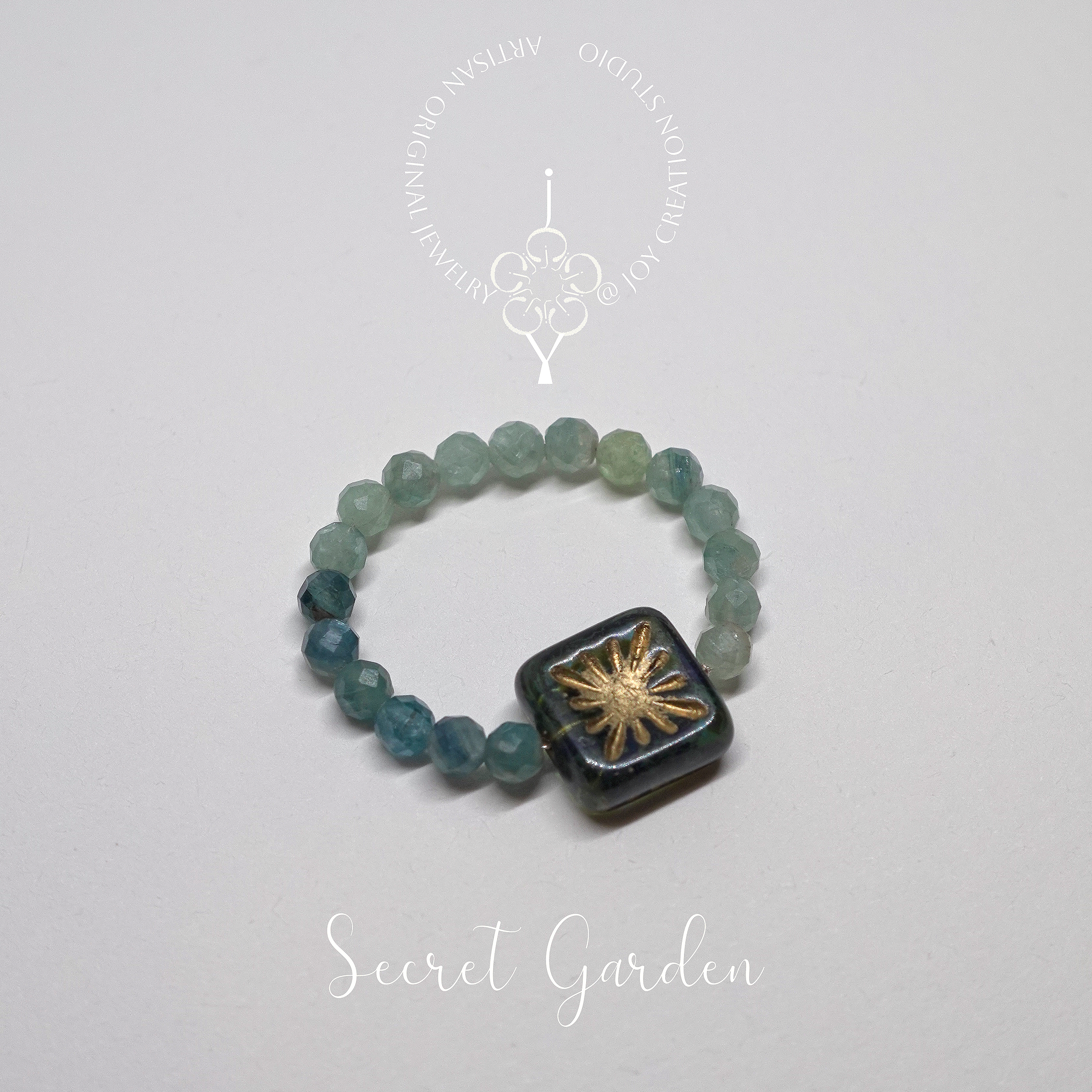Secret+Garden+Ring+12b+with+logo.png