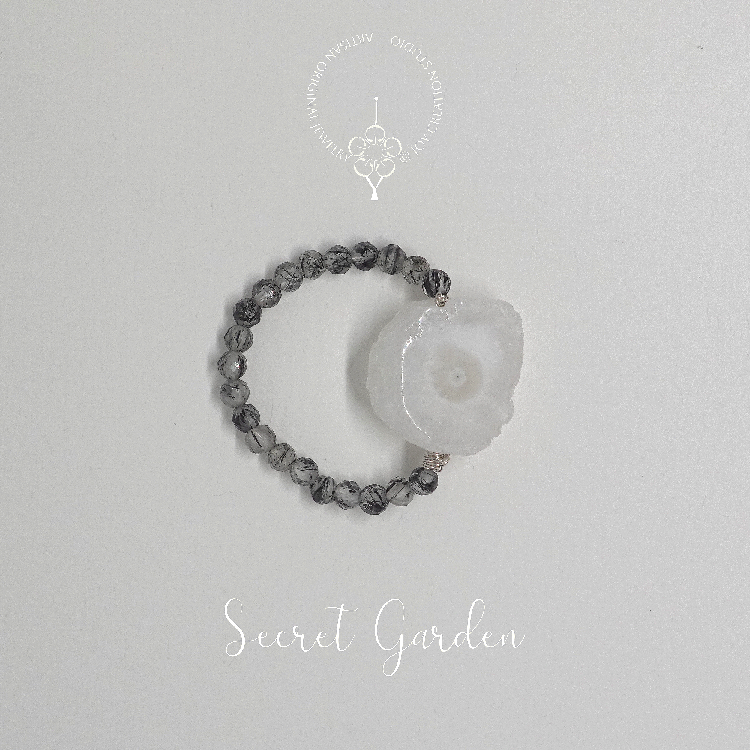 Secret+Garden+Ring+10a+with+logo.png