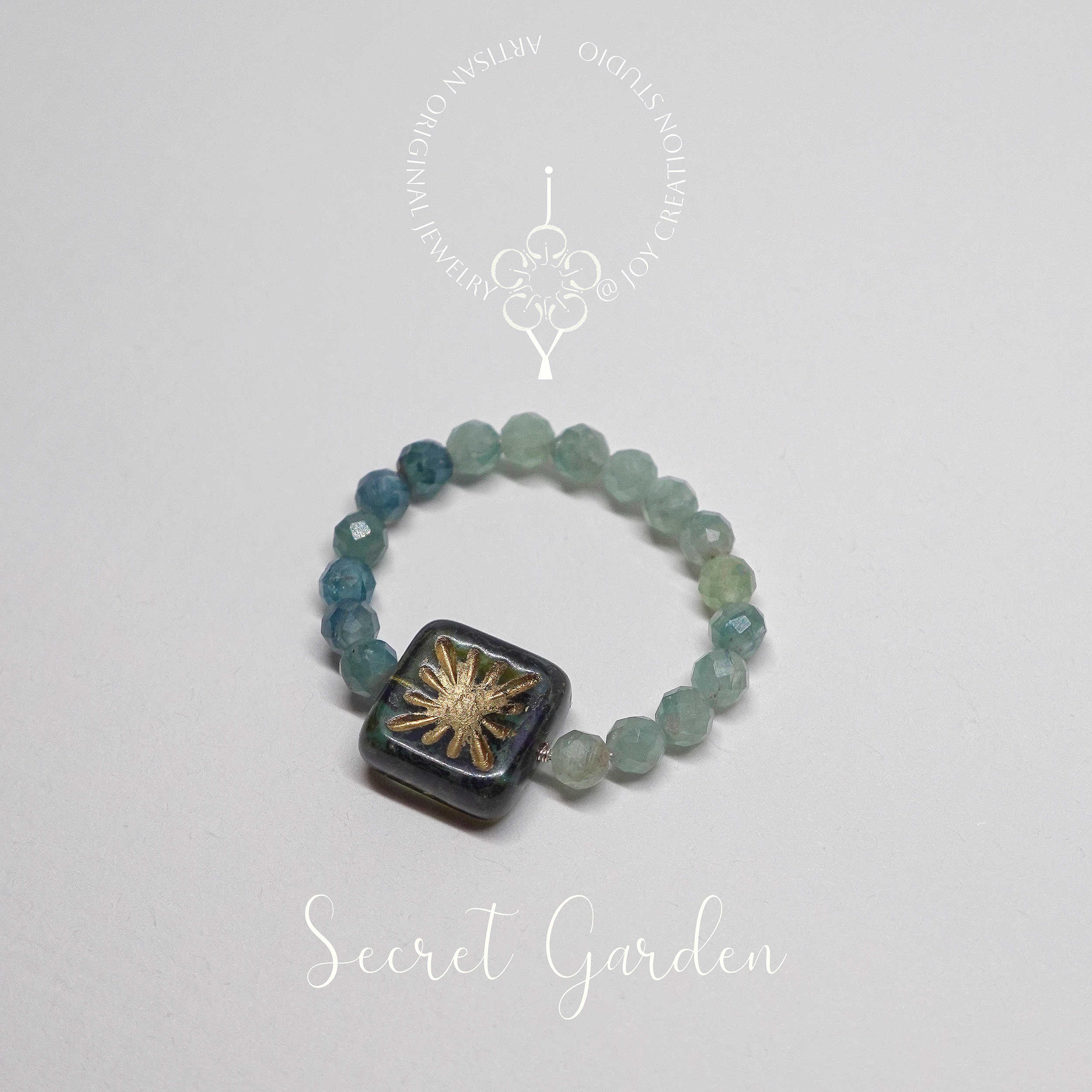 Secret+Garden+Ring+12c+with+logo.png