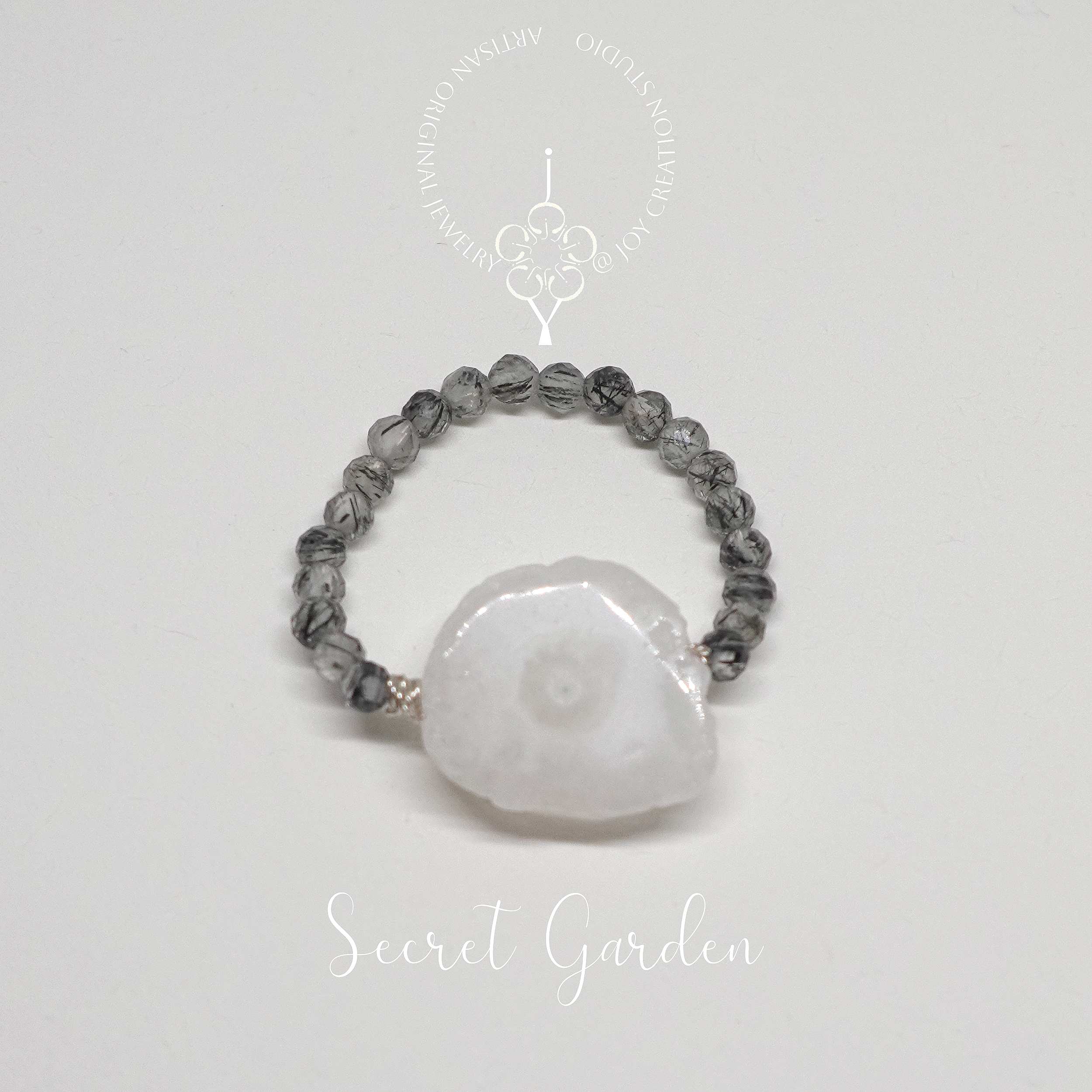 Secret+Garden+Ring+10b+with+logo.png