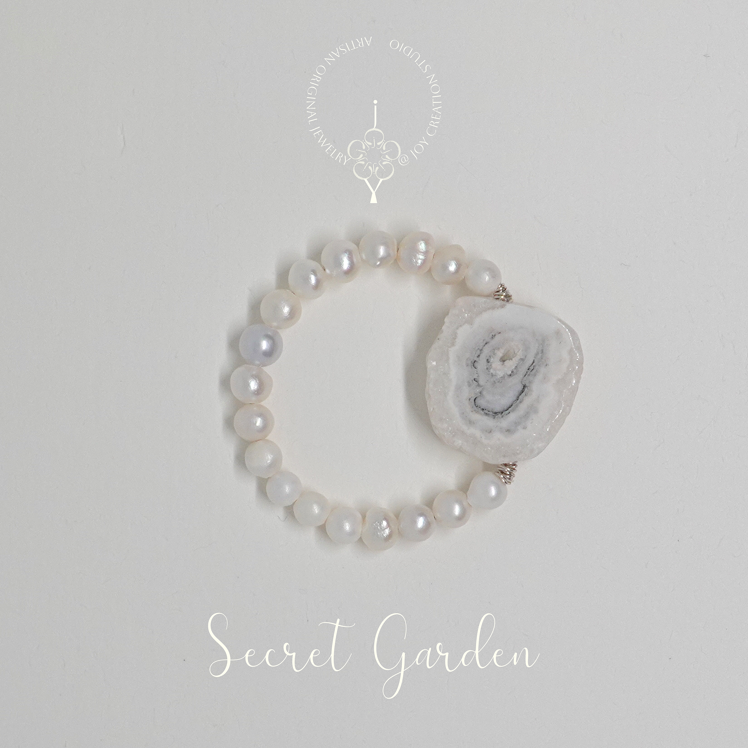 Secret+Garden+Ring+8c+with+logo.png