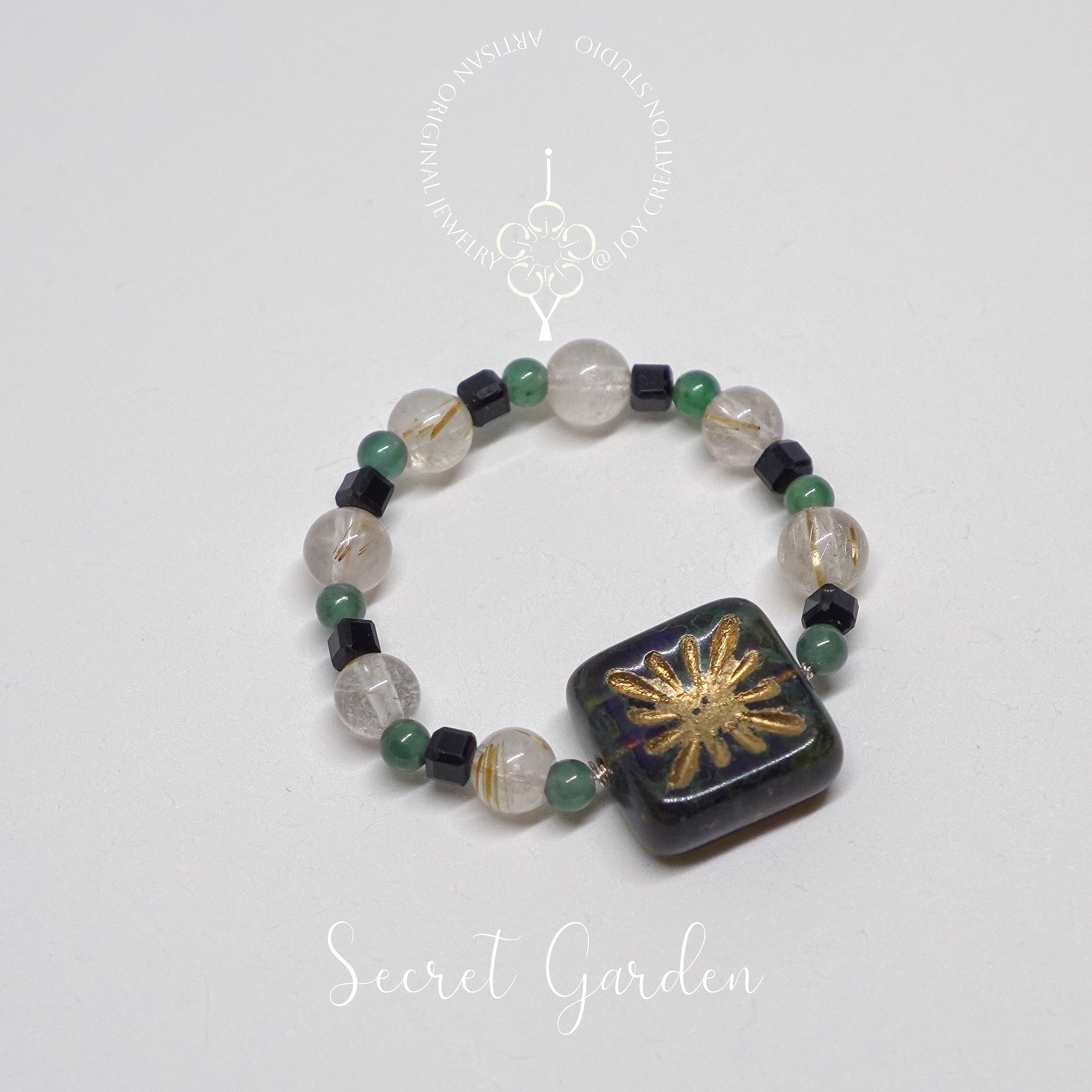 Secret+Garden+Ring+11a+with+logo.png