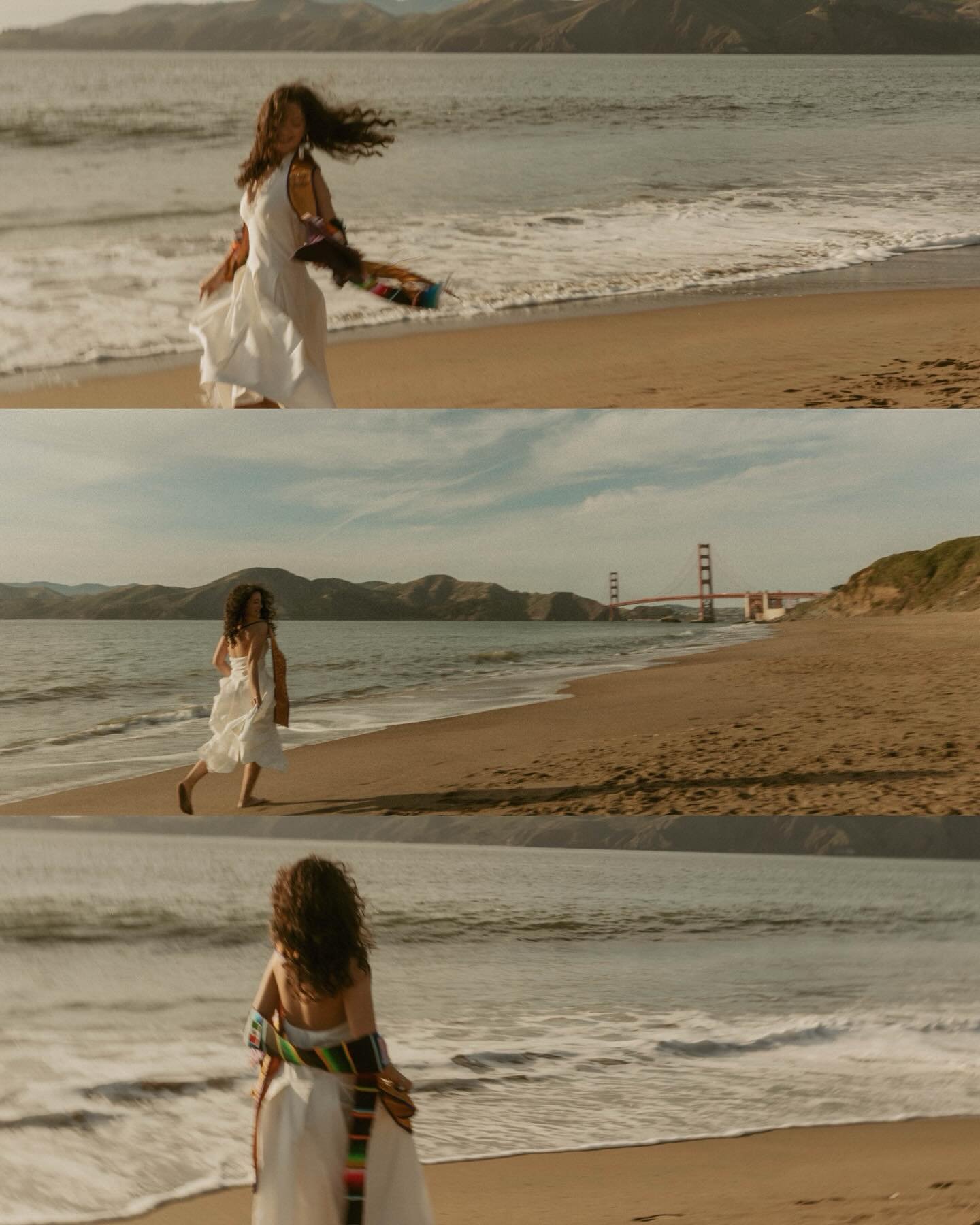 Valerie running on the beach for her grad photos ⭐️⭐️