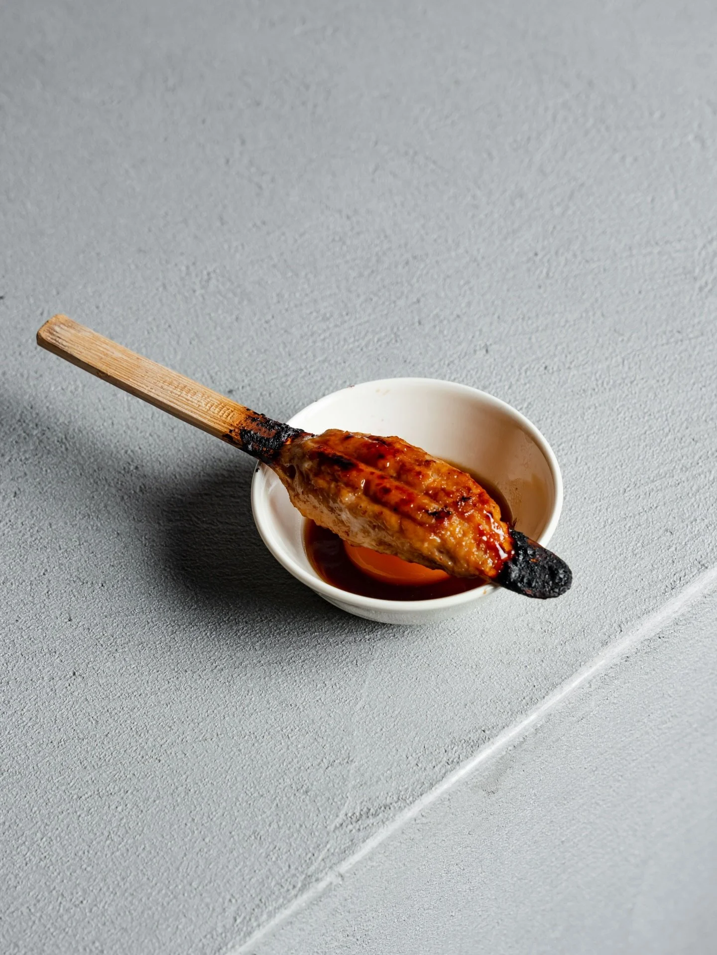 A classic, dipped in gold. 🥚✨

Our handcrafted Tsukune is grilled to juicy perfection, just waiting to be swirled in a creamy, savory Japanese egg yolk. It&rsquo;s a interactive bite rooted in izakaya tradition and utterly irresistible.

Craft you c