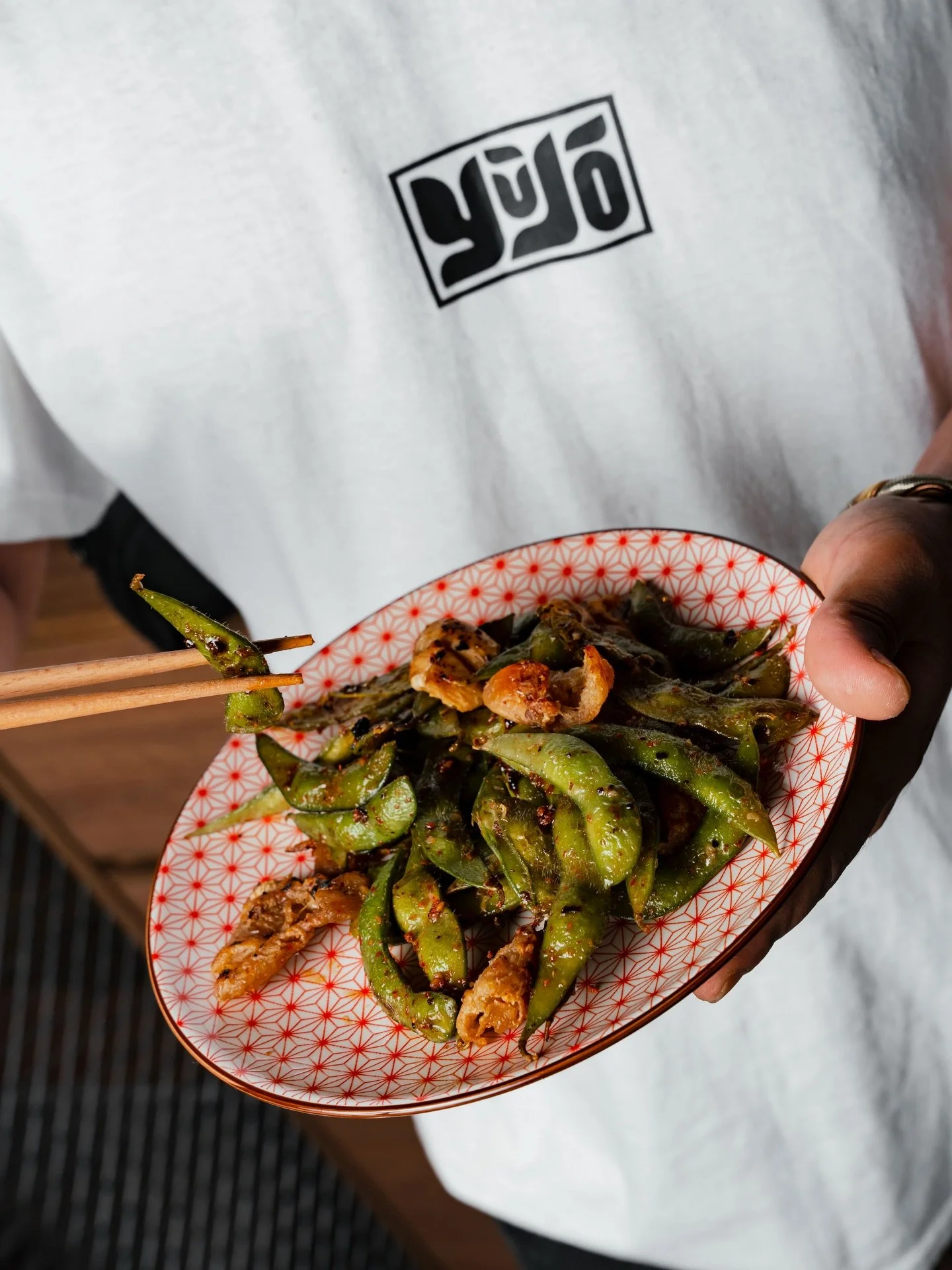 Some snacks are meant to be kept. This one? Made for passing around the table.

Our Firecracker Garlic Edamame comes dressed in bold garlic, spicy chili, and crispy chicken cracklings. It&rsquo;s crunchy, it&rsquo;s fiery, and it&rsquo;s the ultimate