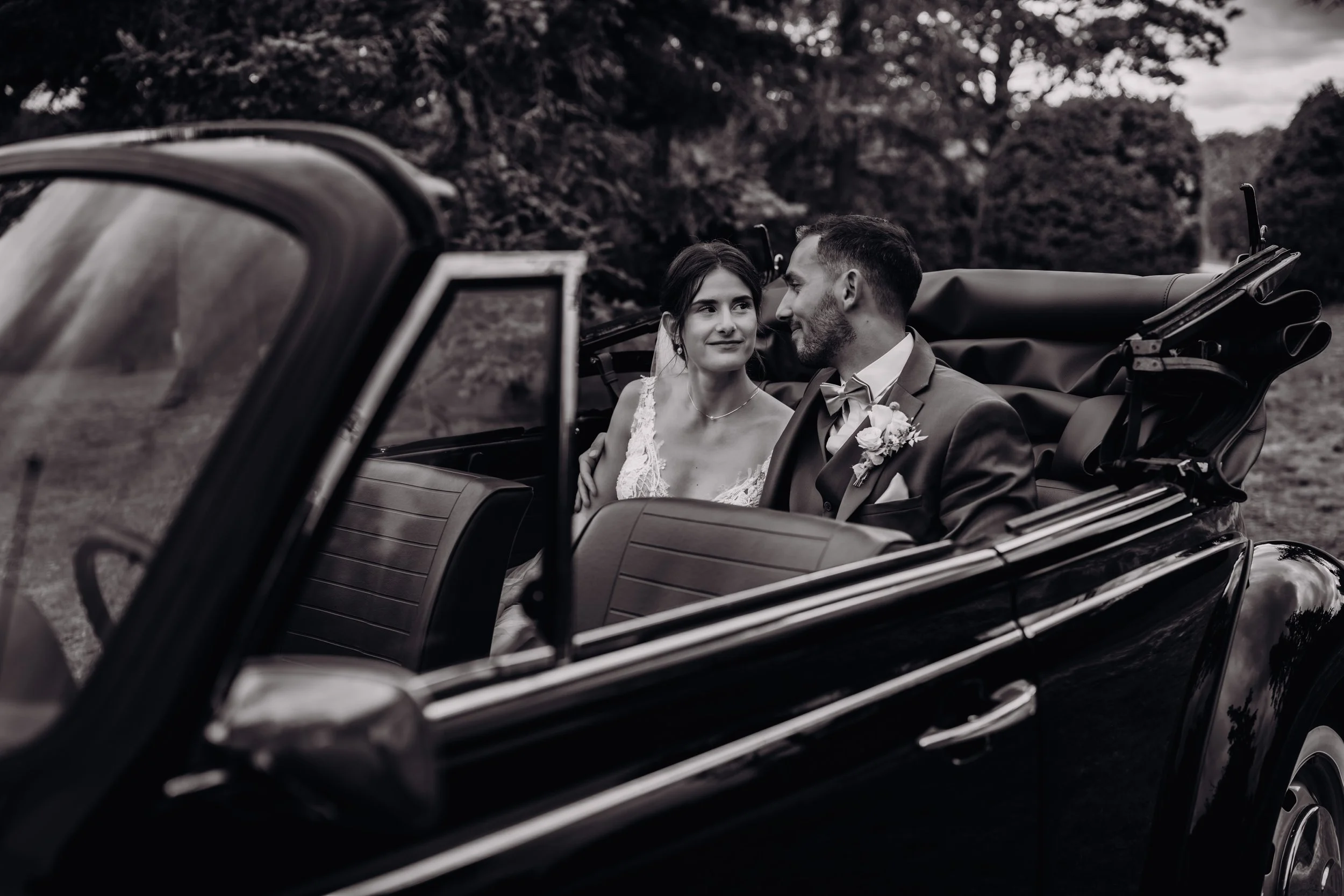 Newlywed couple from Strasbourg in their old fashion car to go to their destination wedding in Toulouse