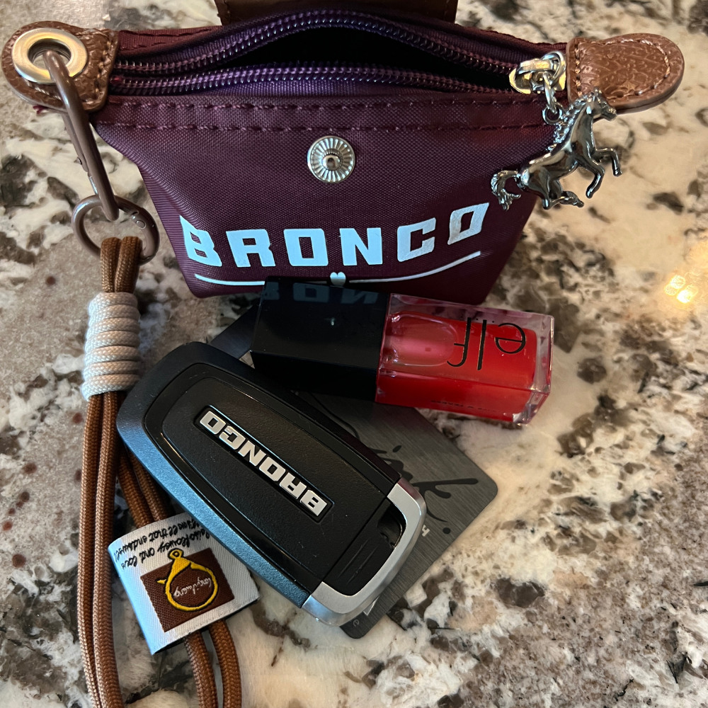 Bronco nylon mini key case in wine showing what fits