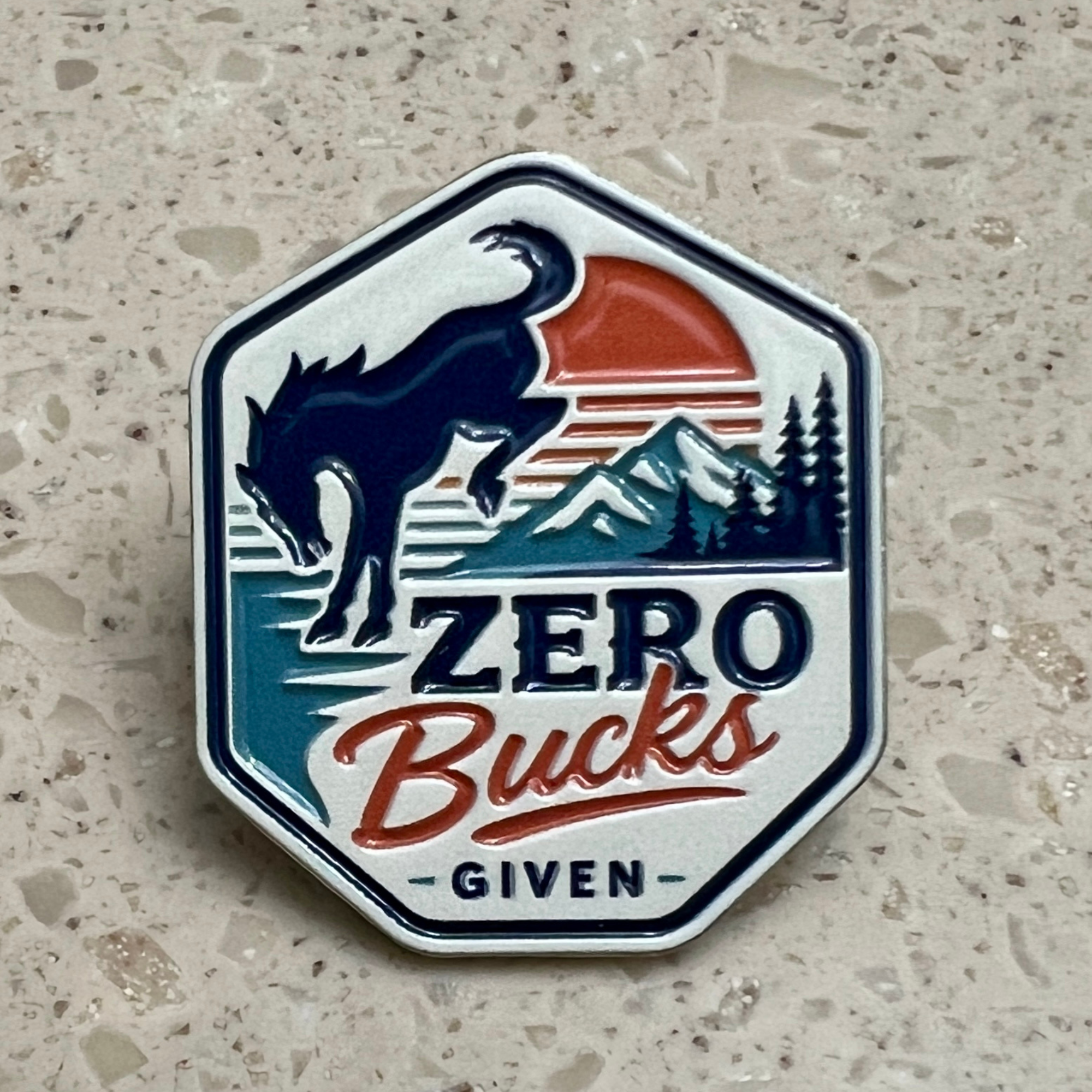 Zero Bucks Given soft enamel pin featuring a bucking horse, mountain landscape, and retro sunset design.