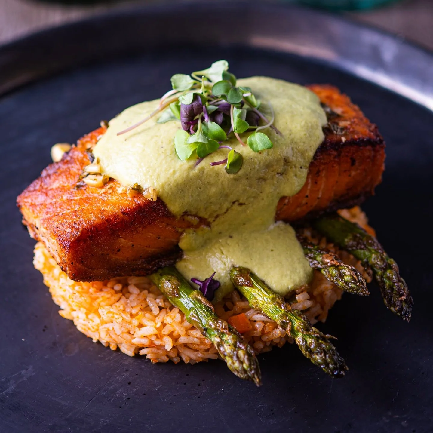 Our grilled Atlantic salmon supreme, fresh flavors and coastal elegance.
Corn, seasonal vegetables, Mexican rice, and a smooth poblano sauce for a bold finish.

One of the highlights of our menu.

And yes &mdash; delicious but also healthy. 🐟

Reser