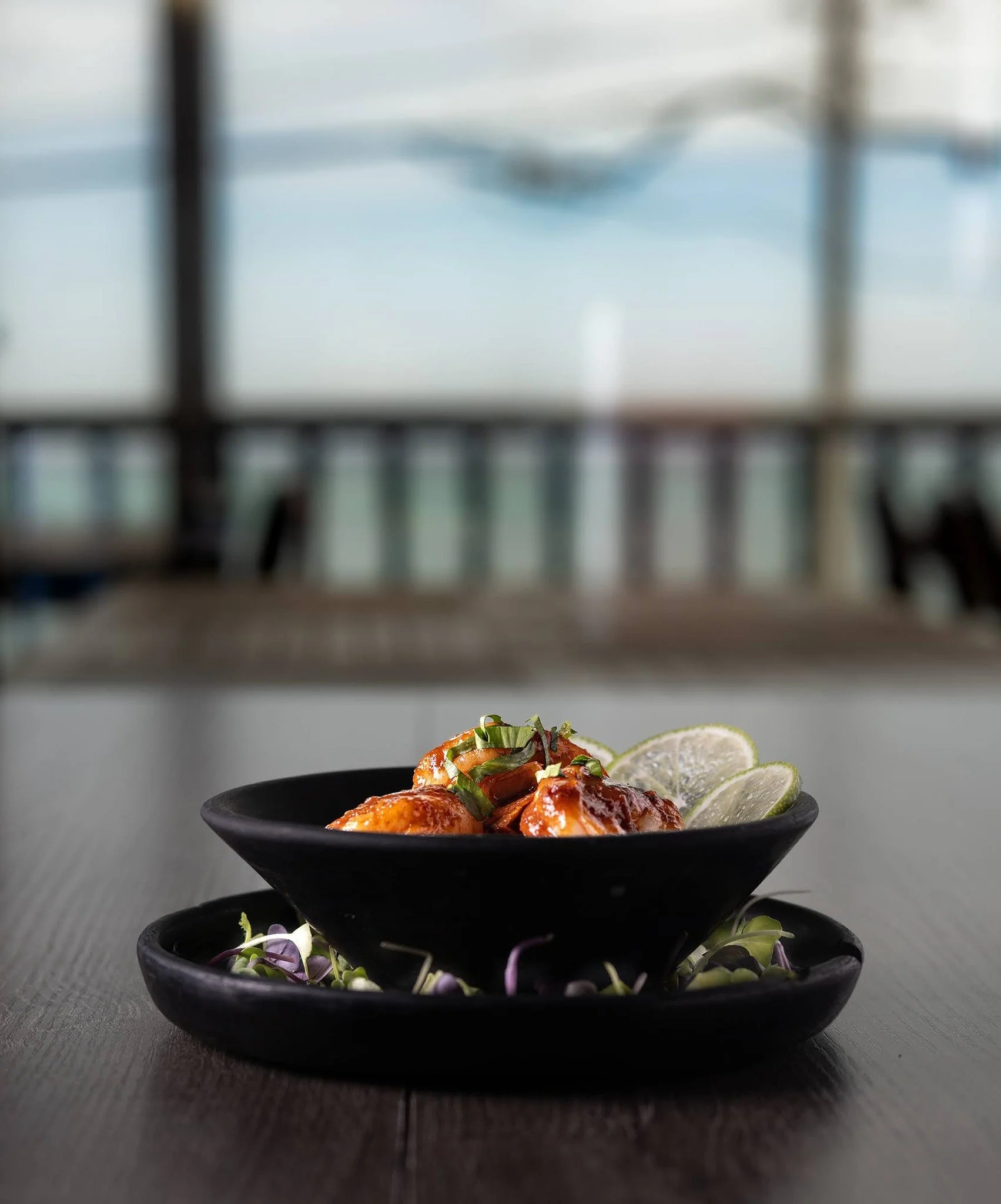'Camarones Enchilados', reimagined by the sea. 🌊🔥
Plump, succulent shrimp bathed in our signature enchilado sauce &mdash; bold, layered, and unapologetically vibrant.

Each plate at the house is crafted to match the rhythm of the ocean right in fro