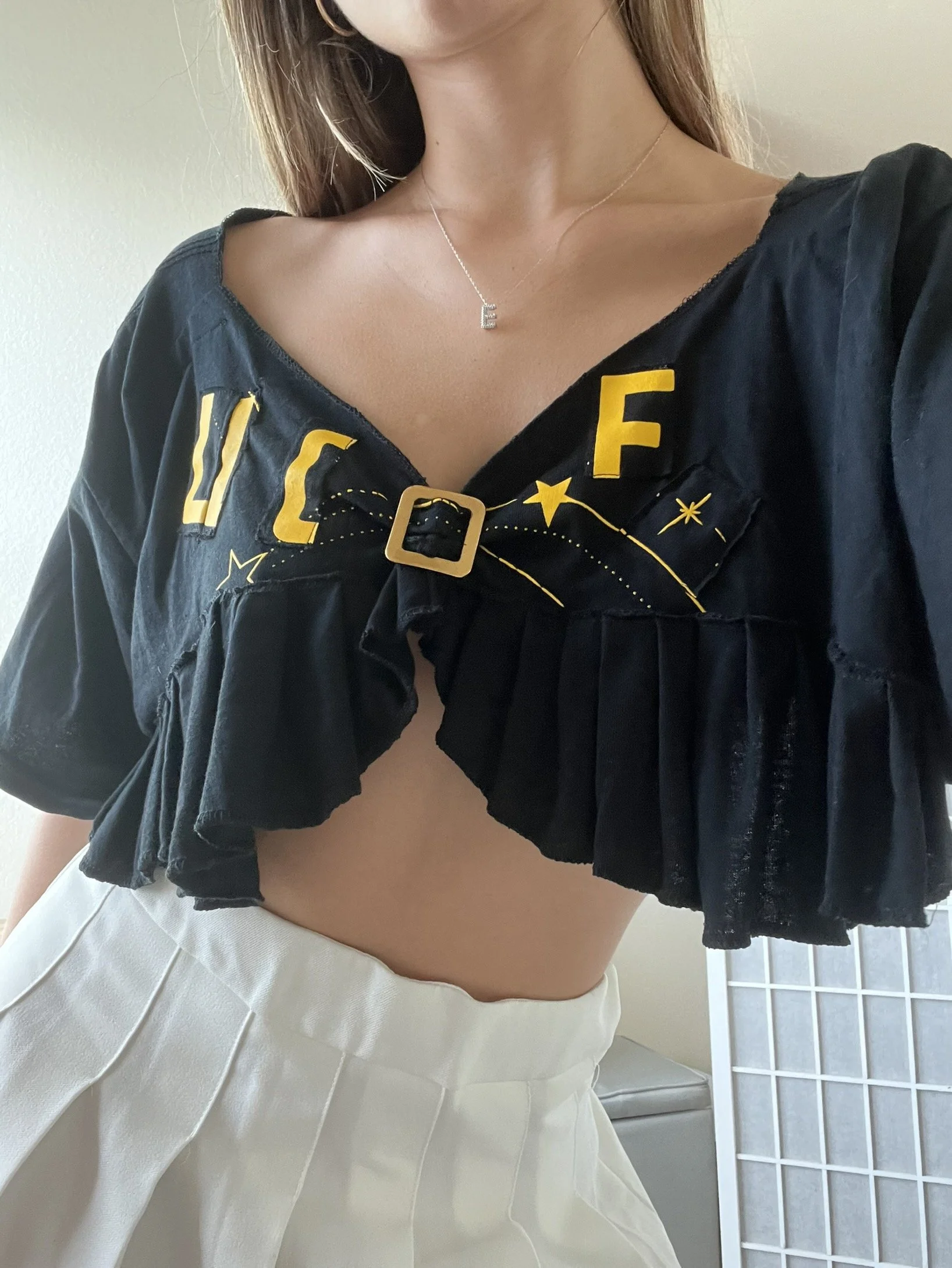 UCF ruffle and buckle top.jpg