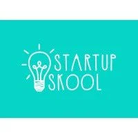 Logo for Startup Skool featuring a lightbulb with a smiling face on a teal background.