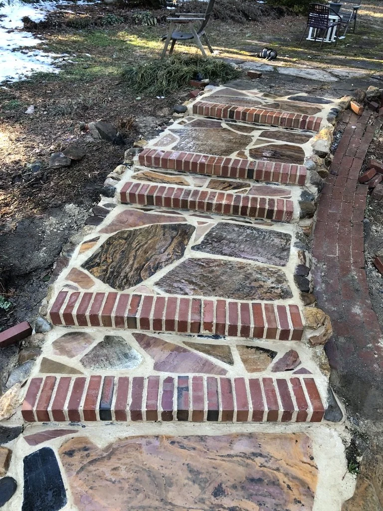 Stone steps in yard.jpeg
