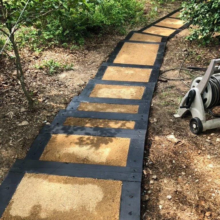 Sturdy aggregate pathway &amp; staircase for bicycling from the road to the back door of the house. 

#yardmakeover&nbsp;#yardmod&nbsp;#trianglenc&nbsp;#landscapingproject&nbsp;#homeownershipgoals&nbsp;#masonrywork&nbsp;#gardendesign&nbsp;#backyardde