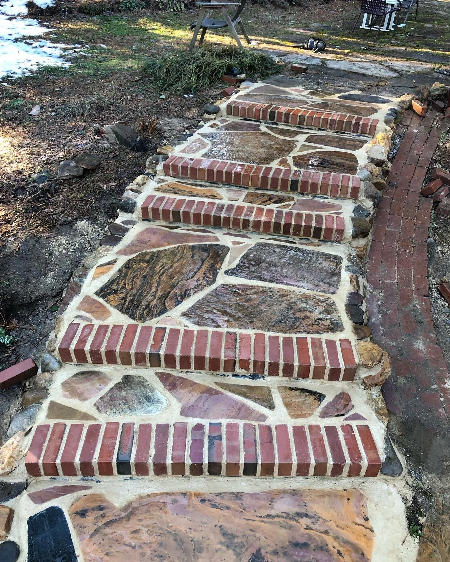 Some recent work. I&rsquo;m loving all the flagstone patio, and I want to do more herringbone brickwork. Numbers three and five were under the tutelage of @brooksb66 Natural Stone Installations at @sarahpdukegardens. #yardmakeover #yardmod #backyardd