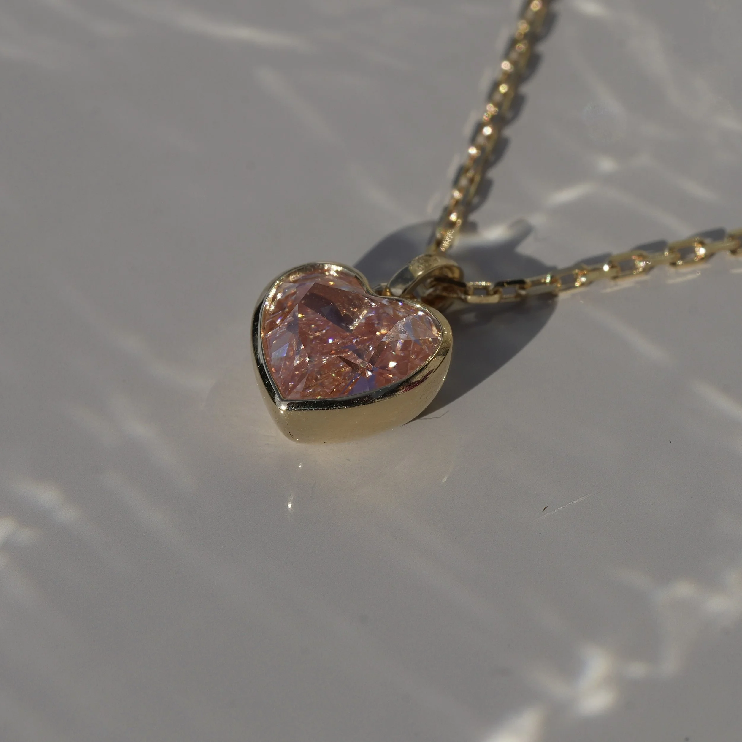 2ct Fancy Vivid Pink Heart Diamond Pendant in 18K Yellow Gold, IGI Certified – Side View | Eighty8Diamonds