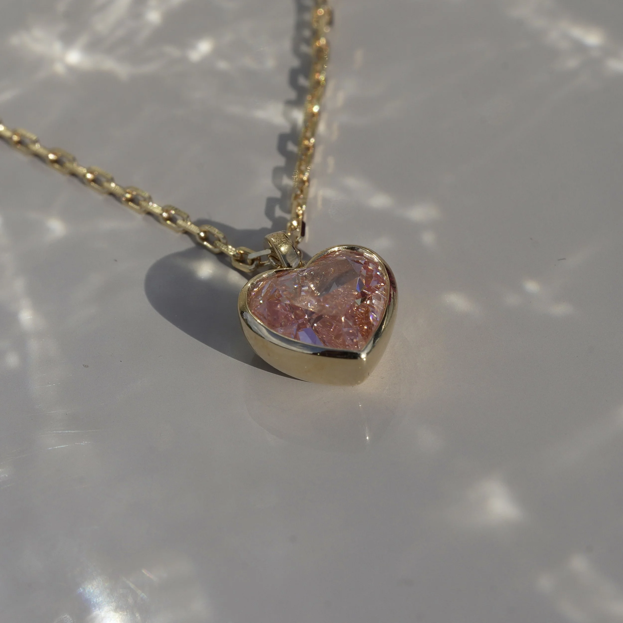 2ct Fancy Vivid Pink Heart Diamond Bezel Pendant – 18K Yellow Gold