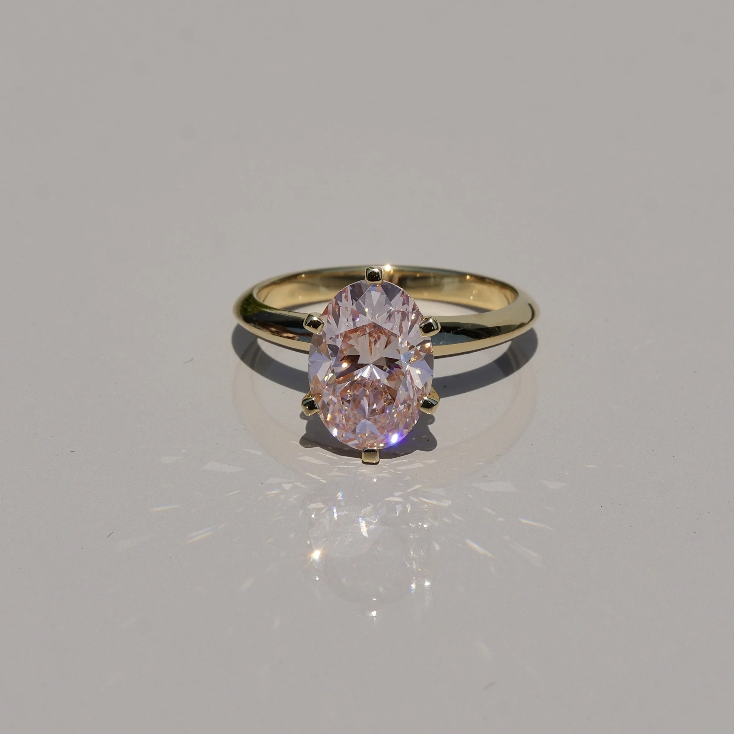 3ct Oval Cut Pink Diamond Engagement Ring  Flower Setting in 18ct Yellow Gold - Side View |