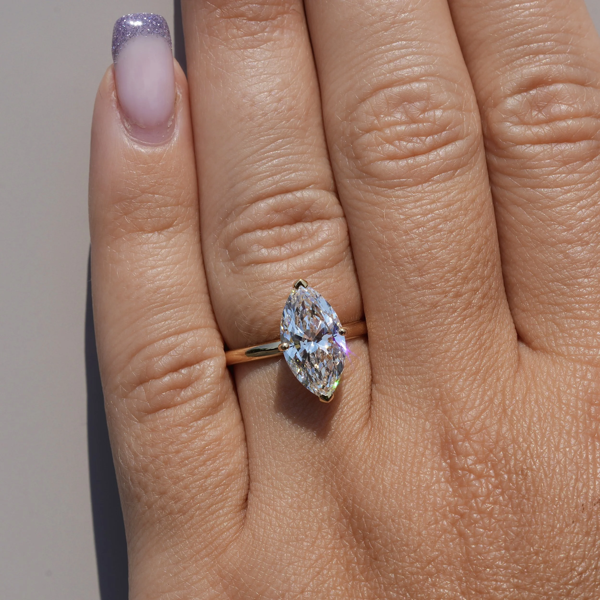 3carat-marquise-diamond-solitaire-18ct-yellow-gold-eighty8diamonds-on hand