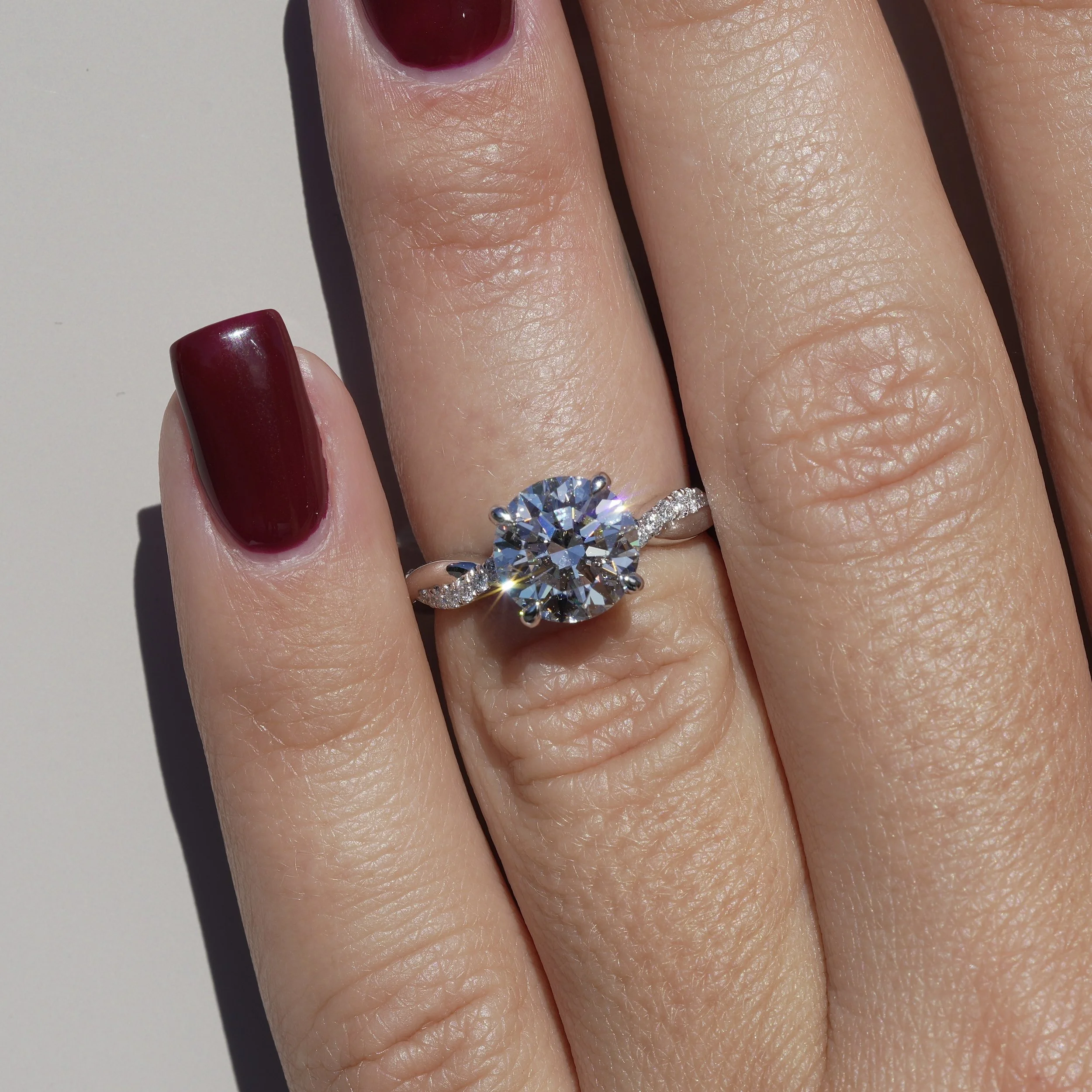 2ct Round Brilliant Diamond Twist  Band Ring in Platinum –Hand View | Eighty8Diamonds