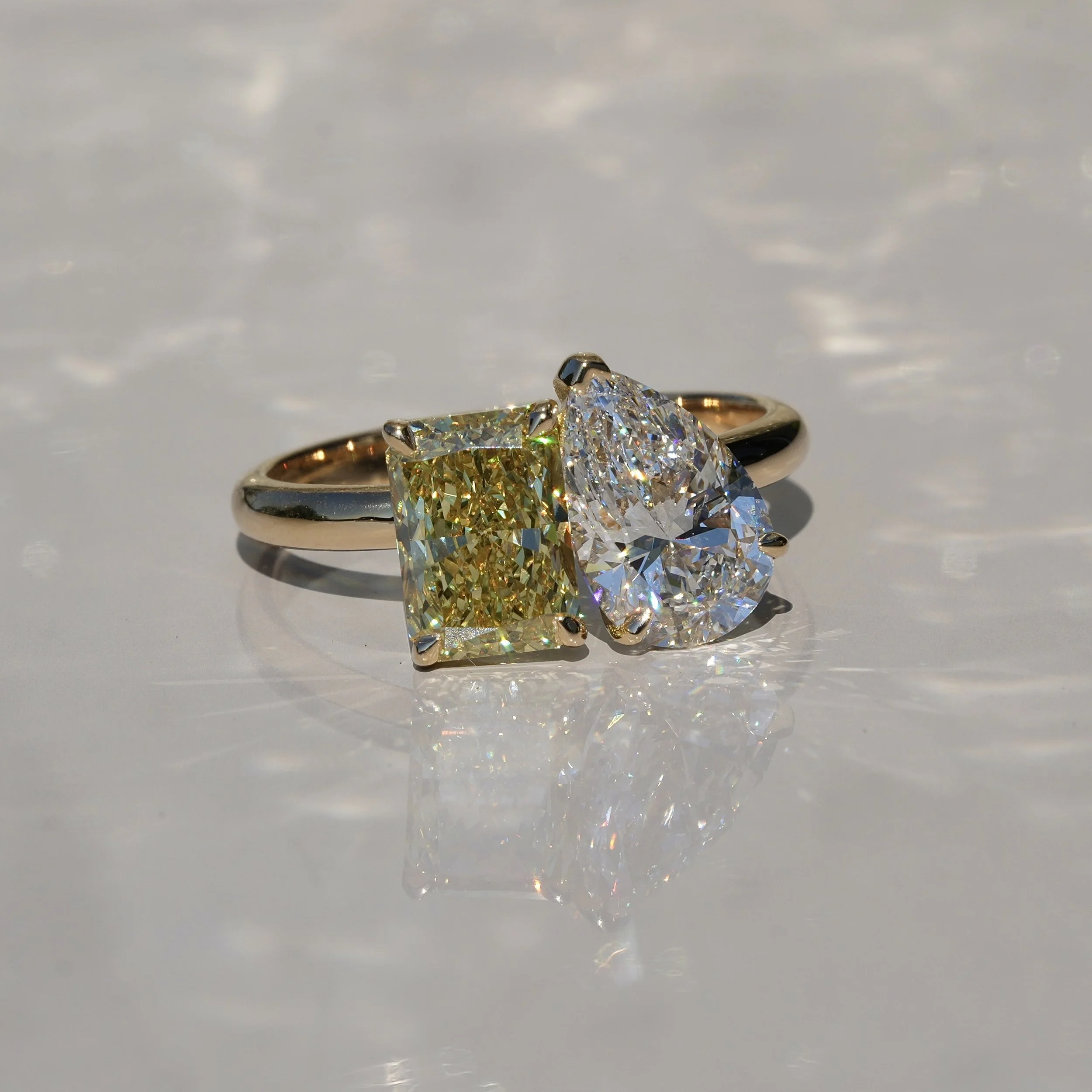 Toi et Moi Ring with 1.5ct Fancy Intense Yellow Radiant Cut Diamond and 1.5ct Pear Cut Diamond in 18ct Yellow Gold, Total Carat Weight 3ct – Box View | Eighty8Diamonds