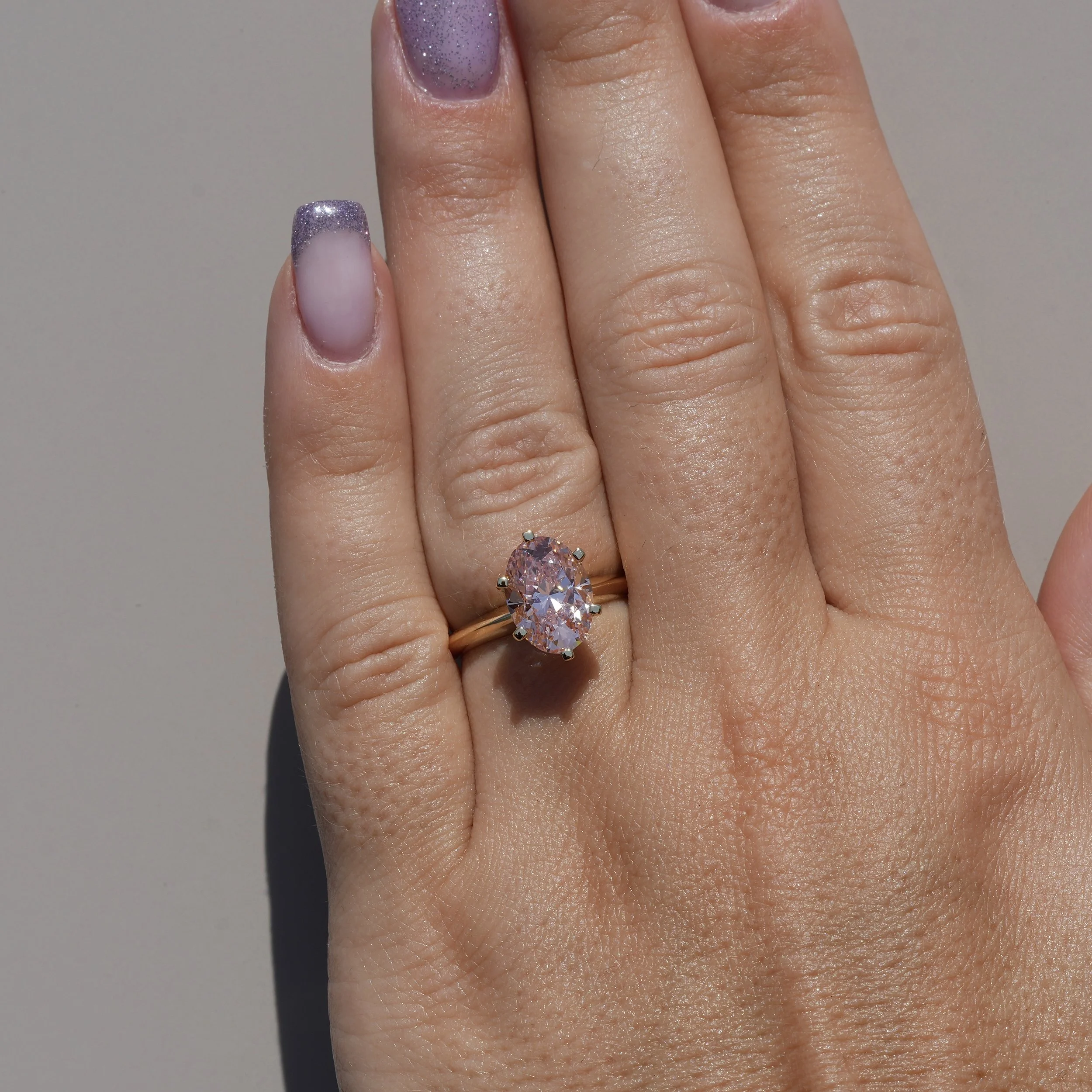 3ct Oval Cut Pink Diamond Engagement Ring  Flower Setting in 18ct Yellow Gold - Hand View |