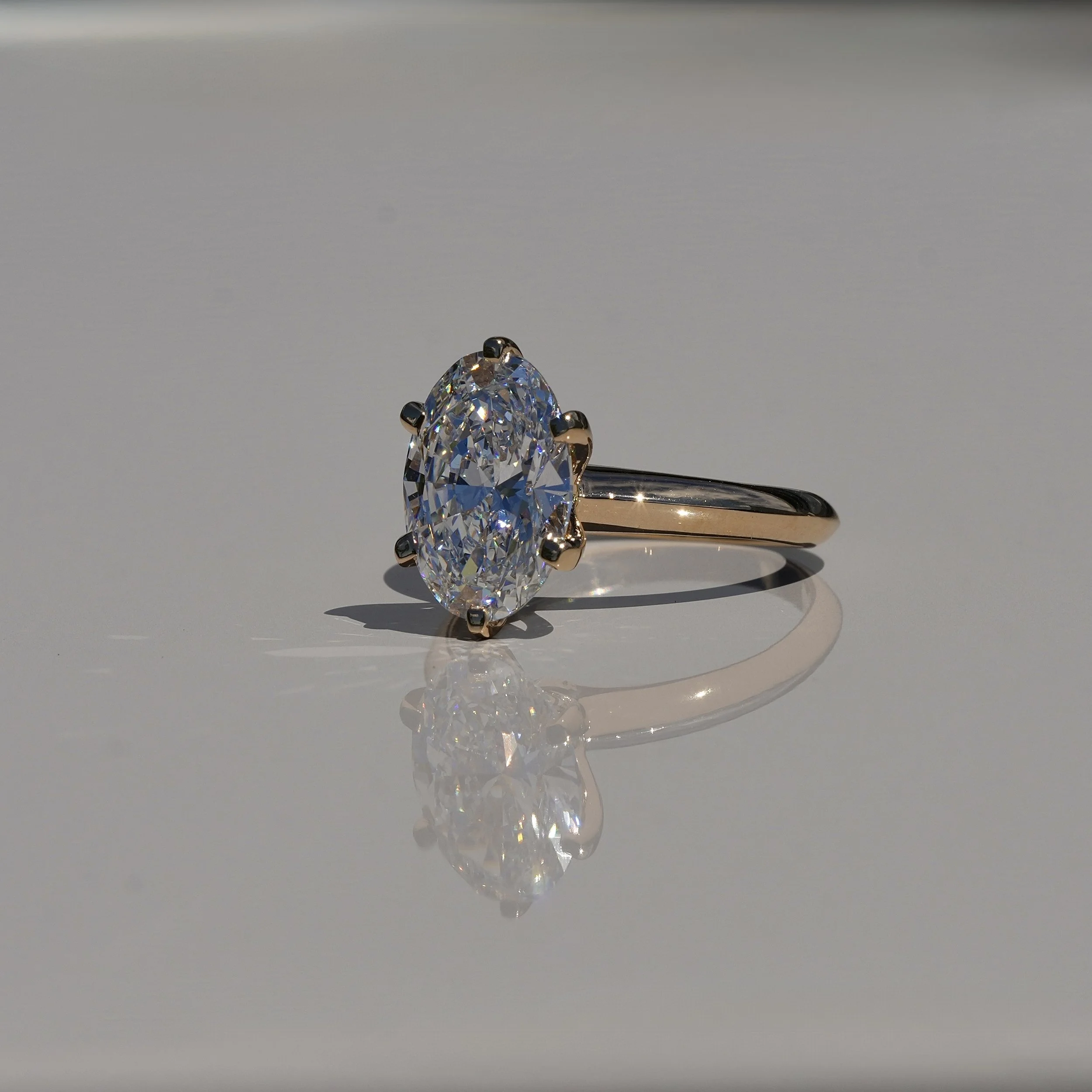 3ct Oval Cut Diamond Engagement Ring  Flower Setting in 18ct Yellow Gold - Angeled View |