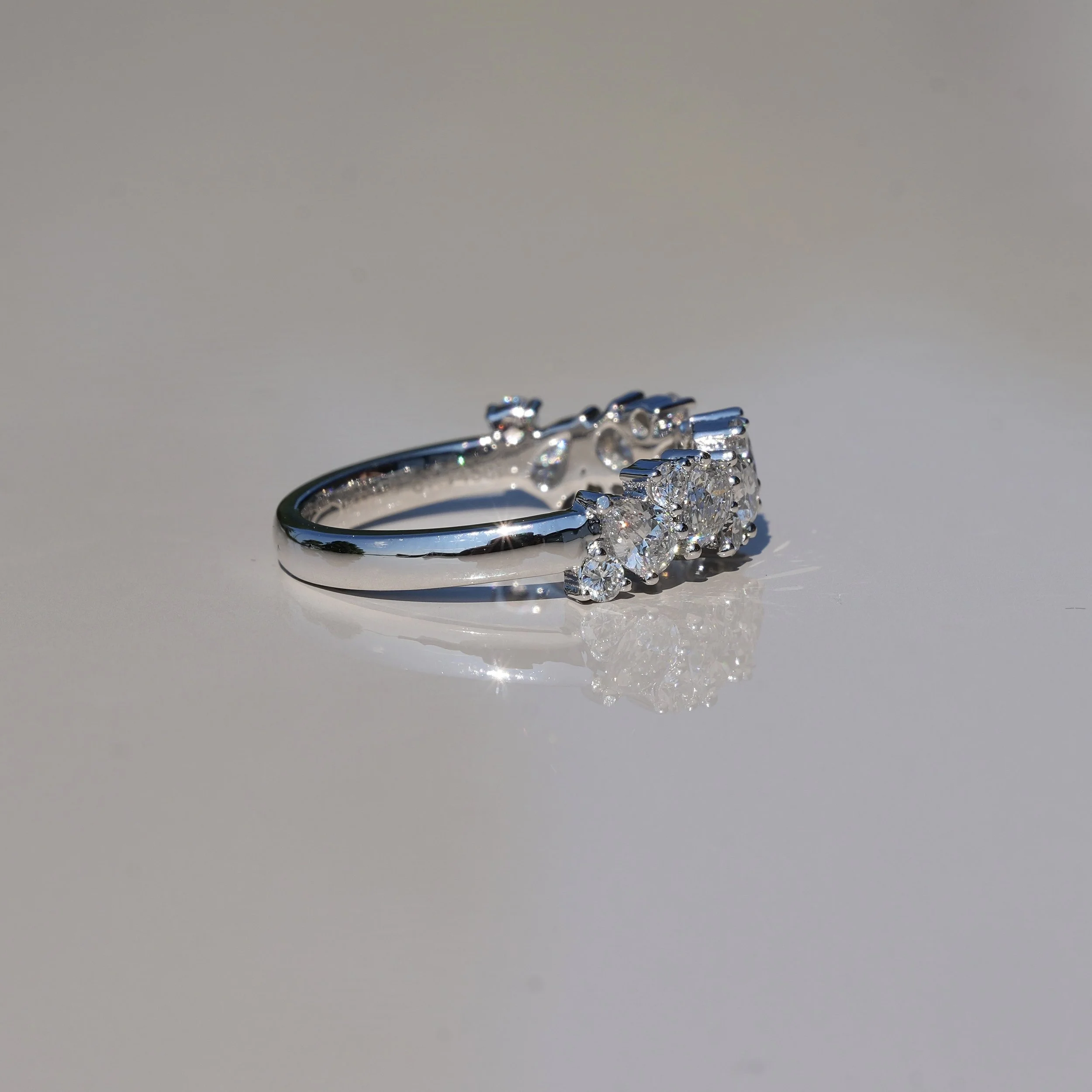 Half Eternity Wedding Ring with Pear and Round Cut Diamonds in Platinum, Total Carat Weight 1.45ct – Side View | Eighty8Diamonds