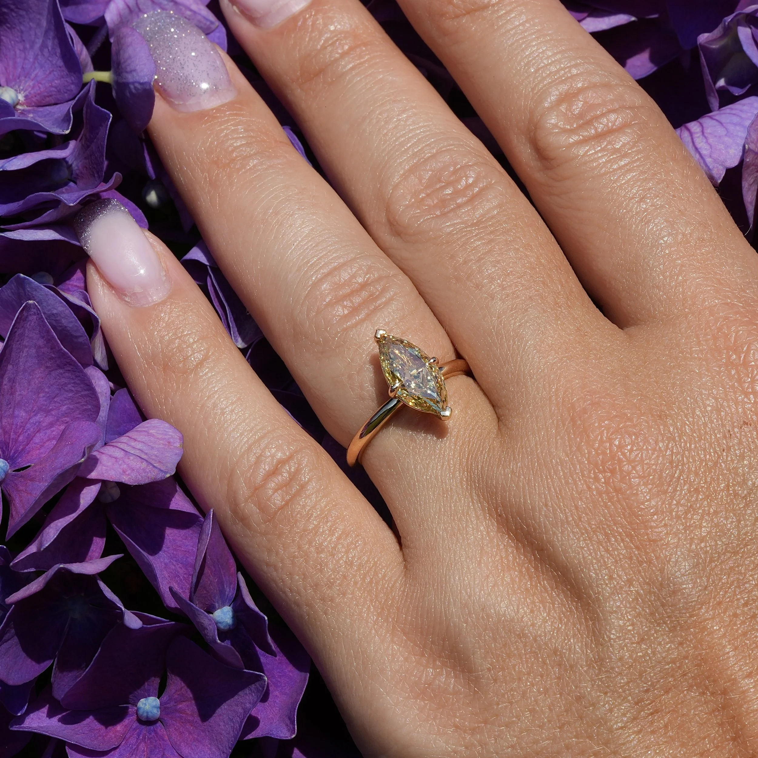 marquise-fancy-yellow-diamond-2carat-solitaire-18ct-yellow-gold-eighty8diamonds-hand-view
