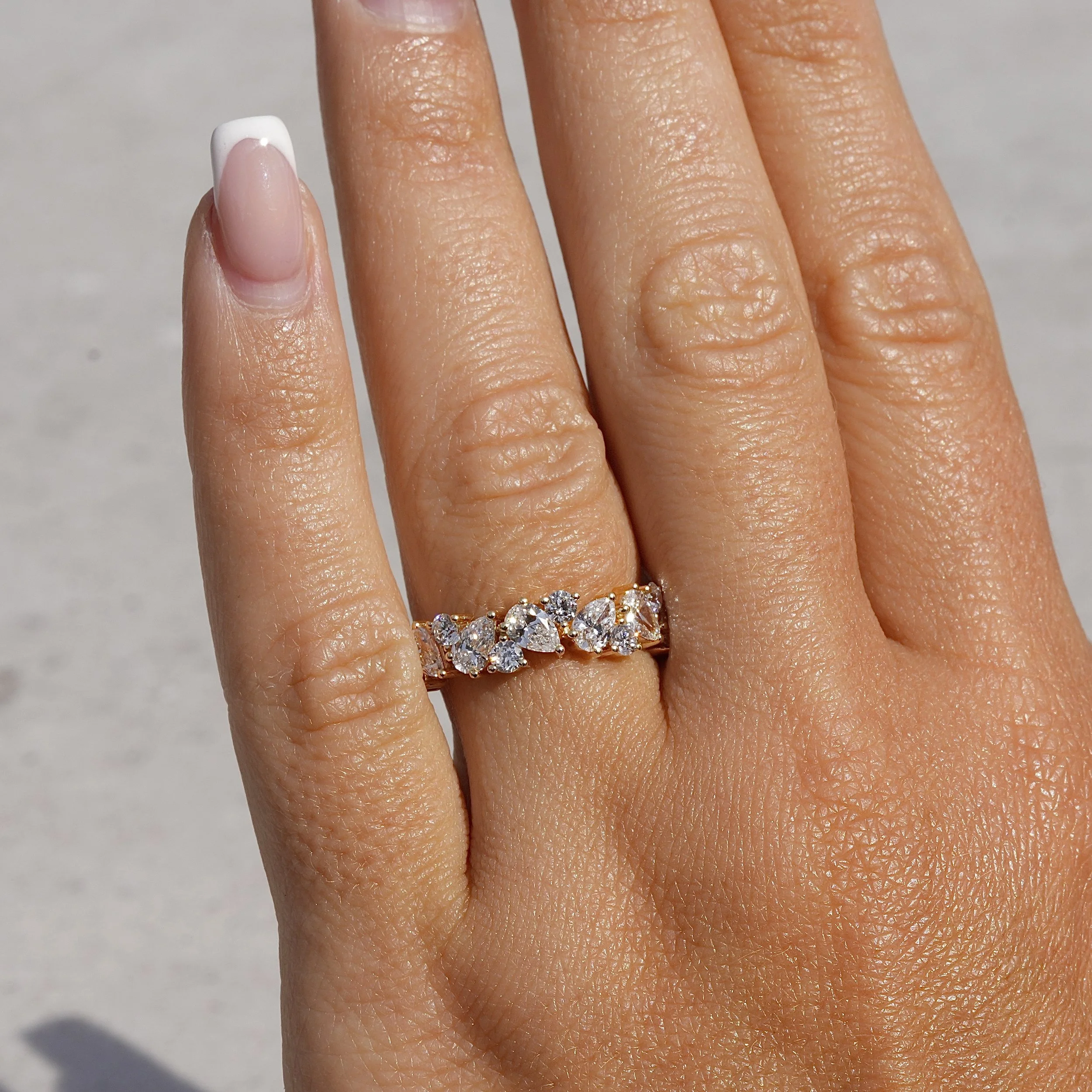 Half Eternity Wedding Ring with Pear and Round Cut Diamonds in 18ct Yellow Gold, Total Carat Weight 2ct – Hand View | Eighty8Diamonds