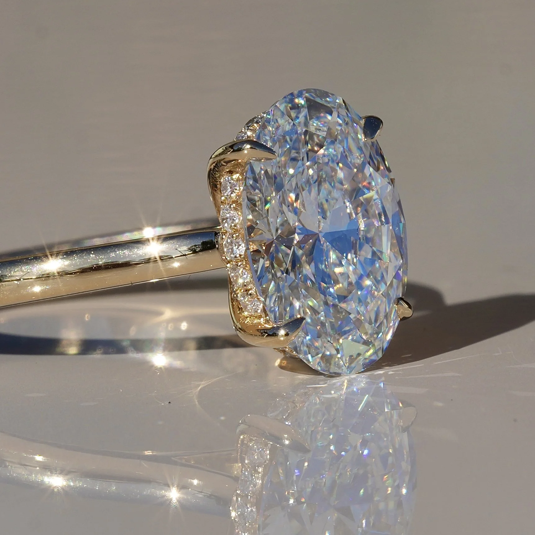 3ct Oval Cut Diamond Engagement Ring With Hidden Halo in 18ct Yellow Gold - Angeled View |