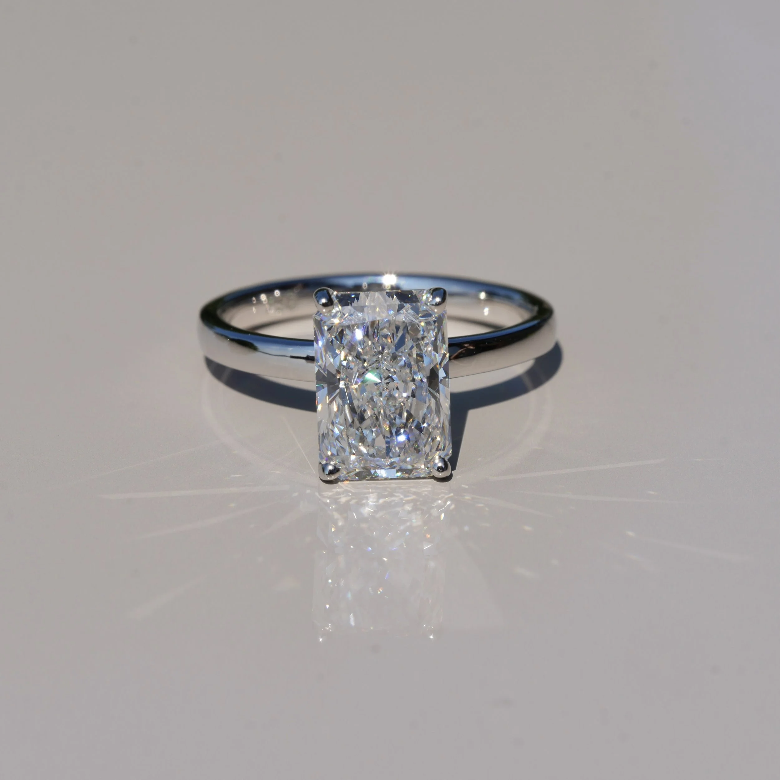 3ct Radiant Cut Diamond Solitaire Engagement Ring in 18ct White Gold – Side View | Eighty8Diamonds
