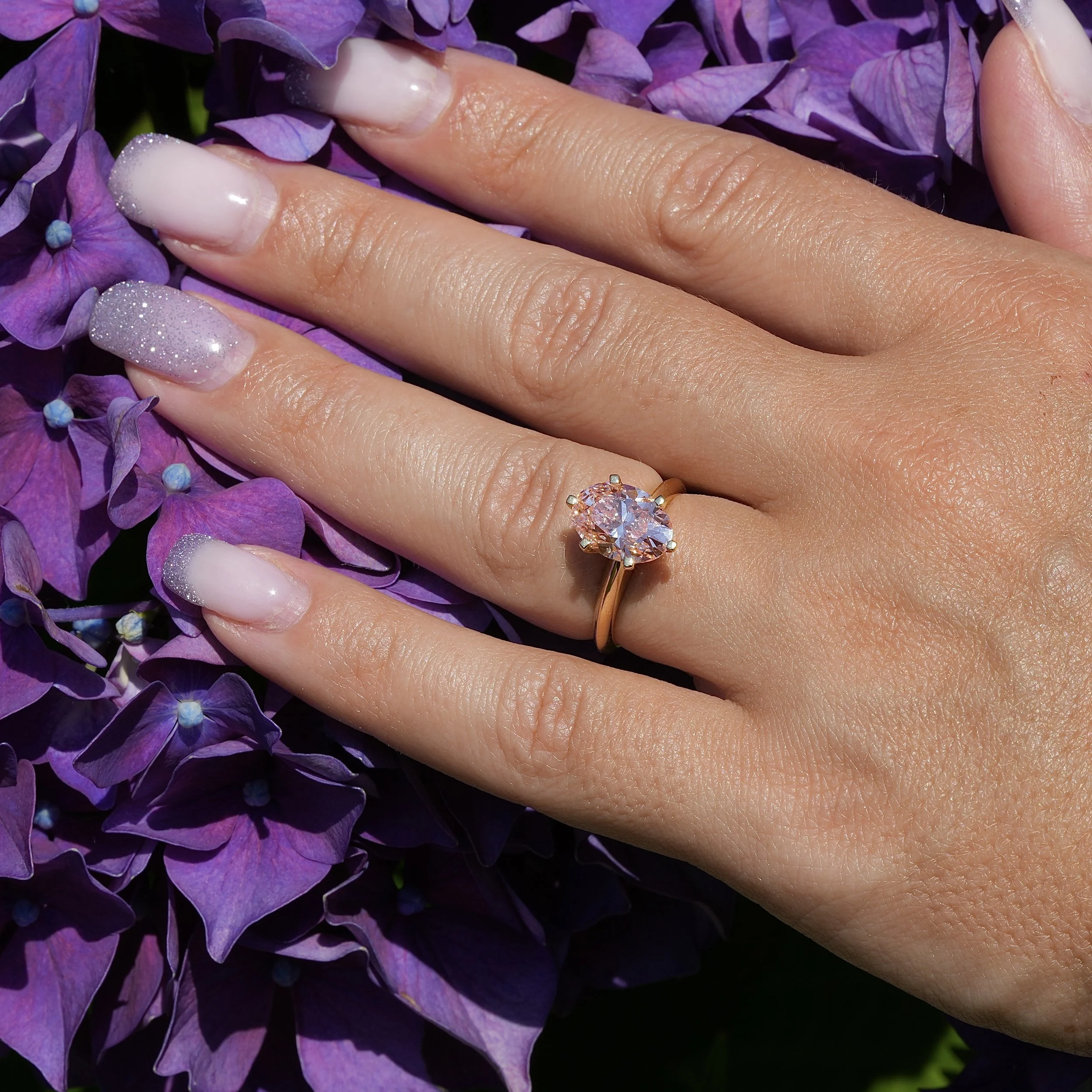 3ct Oval Cut Pink Diamond Engagement Ring  Flower Setting in 18ct Yellow Gold - Hand View |