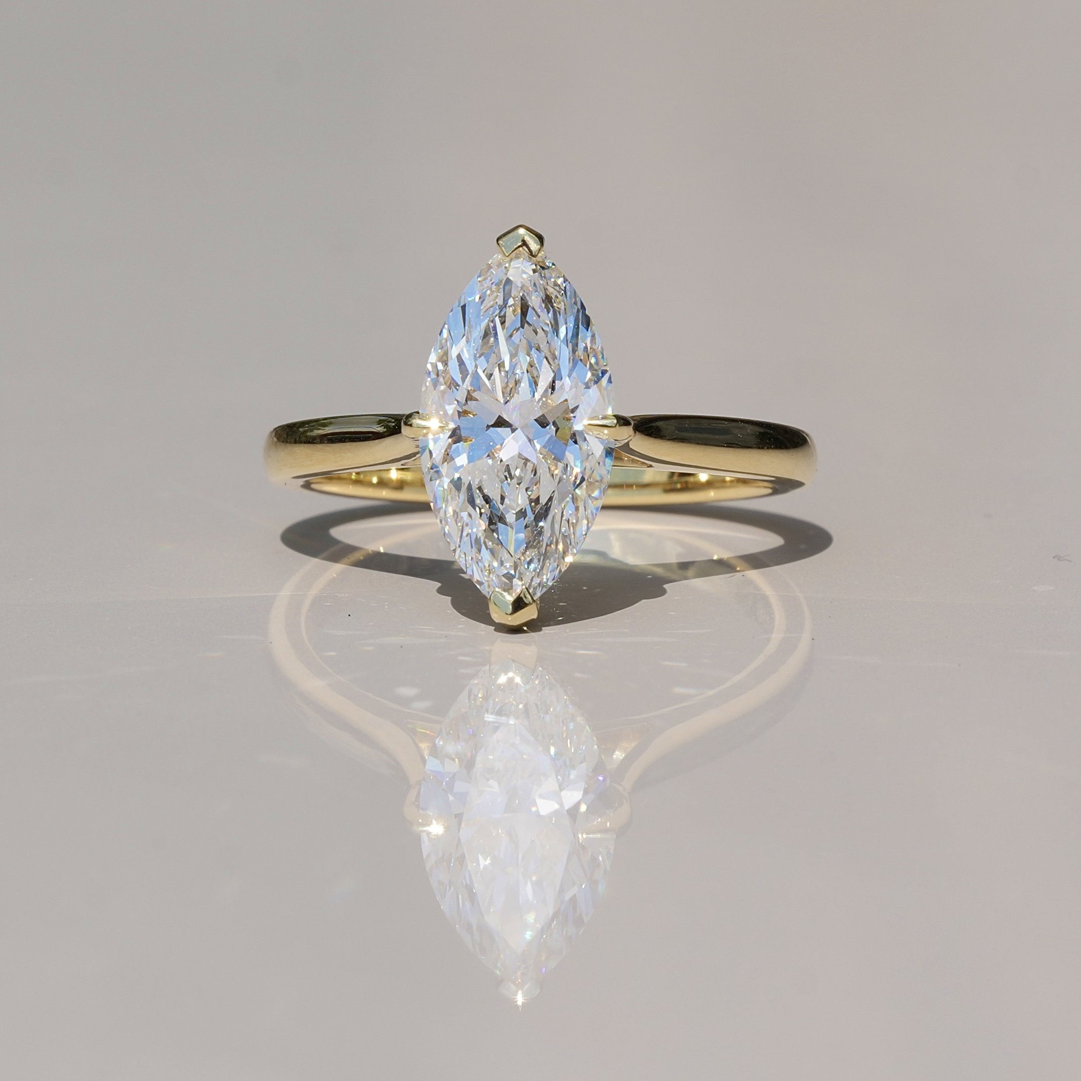 3ct Marquise Cut Diamond Solitaire Engagement Ring with Hidden Halo  in 18ct Yellow Gold – Front View | Eighty8Diamonds