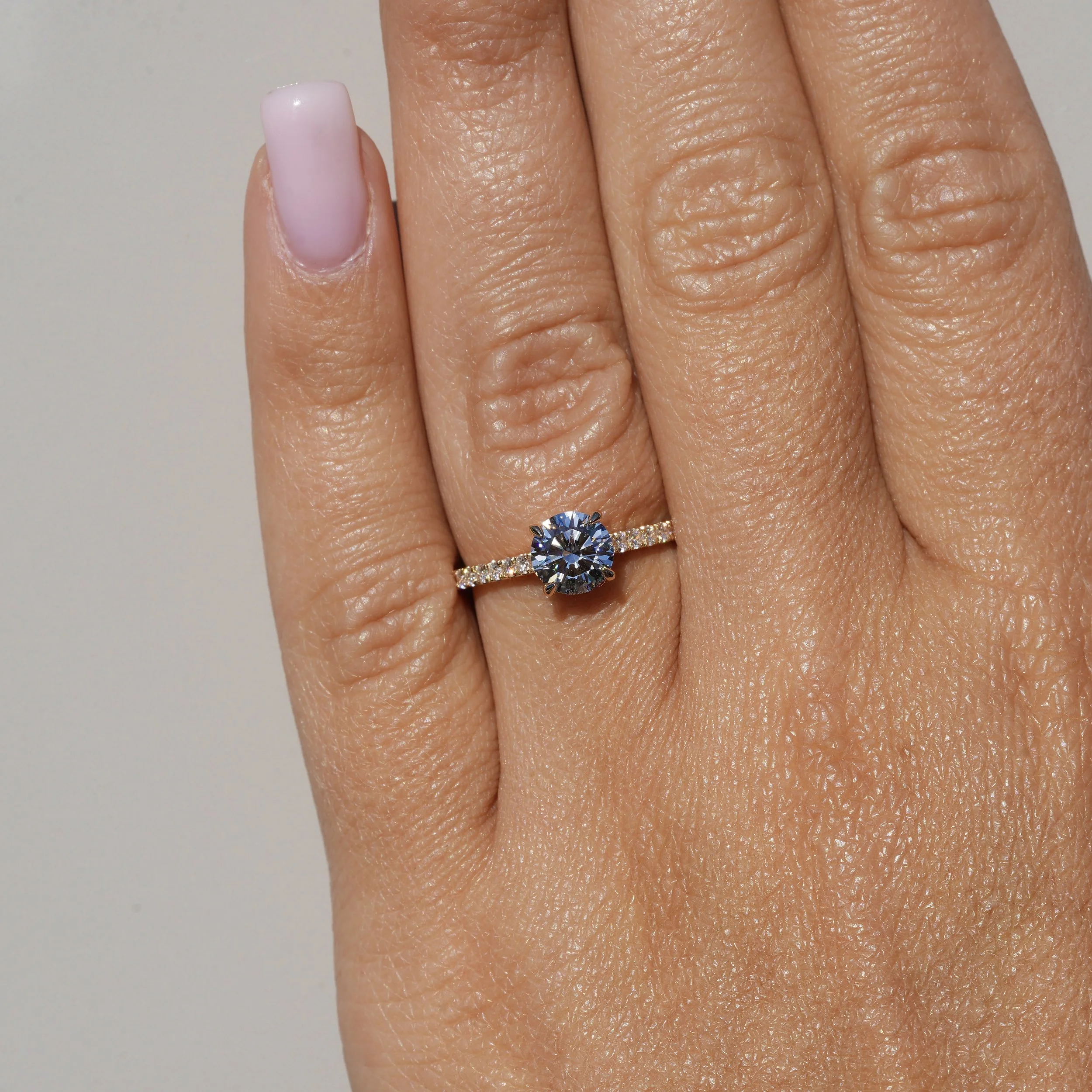 1ct Round Brilliant Cut Diamond Engagement Ring with Diamond Band in 18ct Yellow Gold –Angeled View | Eighty8Diamonds