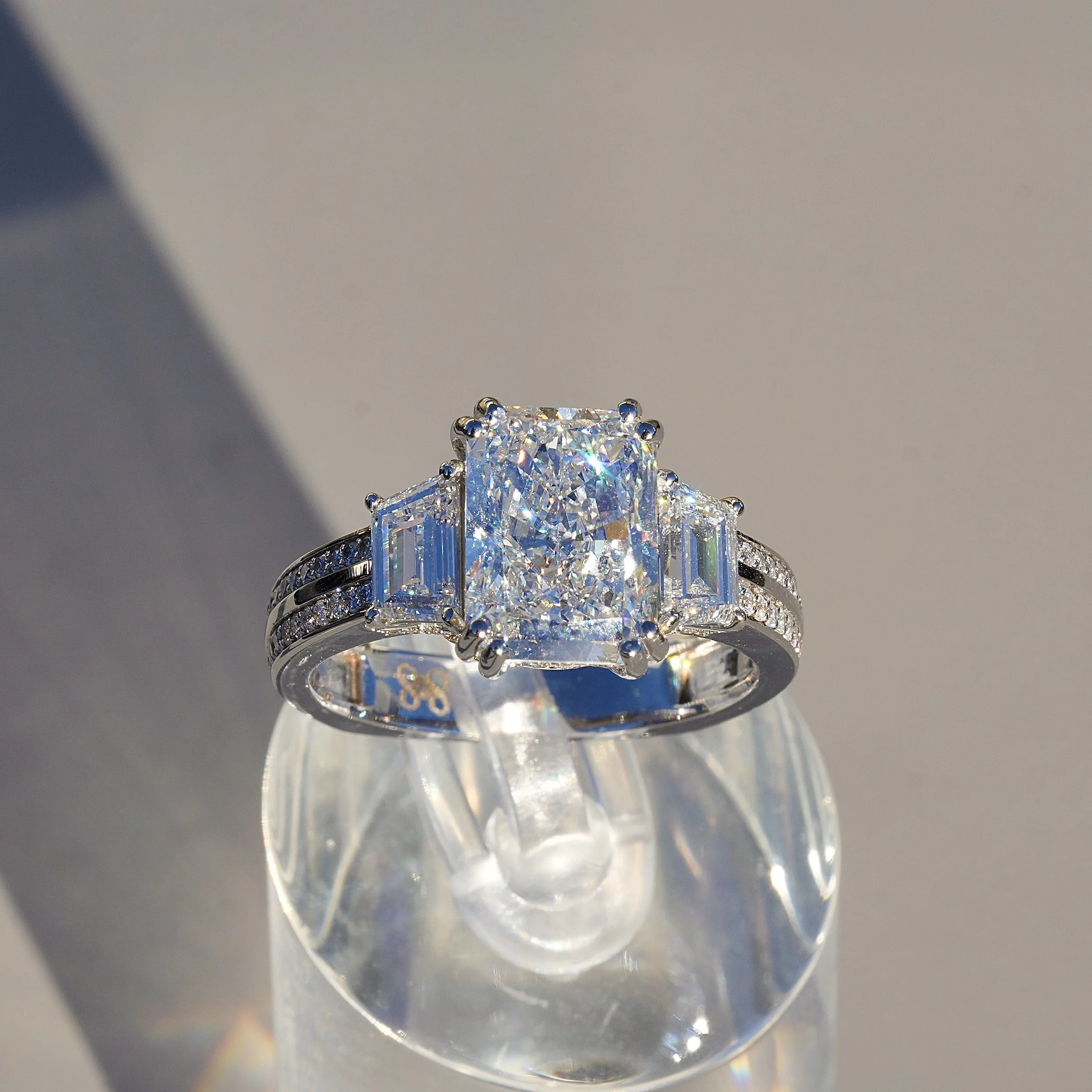 4ct Radiant Cut Diamond Engagement Ring with 3D Diamond Band and Trapezoid Side Stones in 18ct White Gold – Side Angle | Eighty8Diamonds