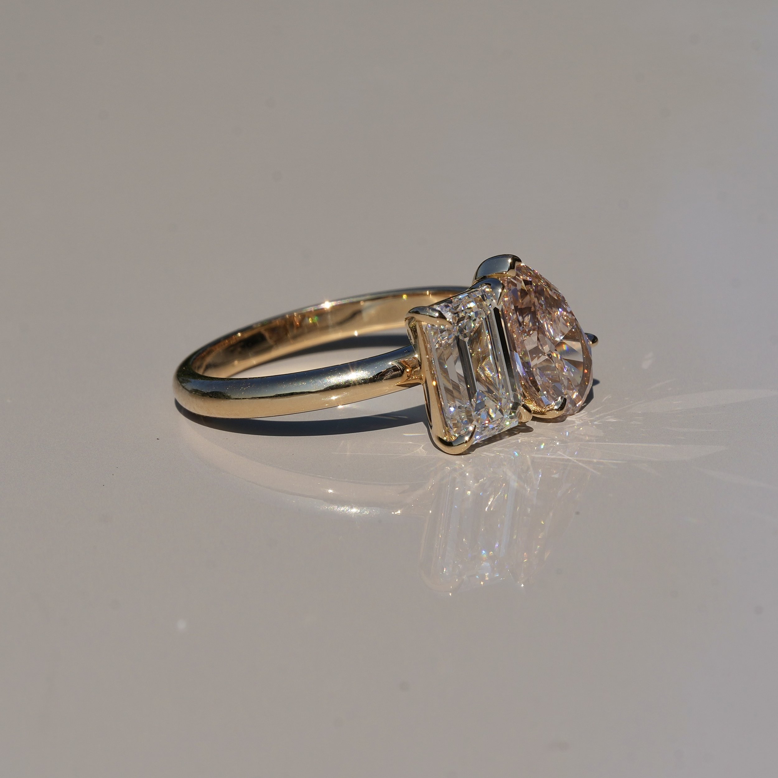 Toi et Moi Ring with 1.5ct Fancy Intense Pink Pear Cut Diamond and 1.5ct Emerald Cut Diamond in 18ct Yellow Gold, Total Carat Weight 3ct – Back View | Eighty8Diamonds