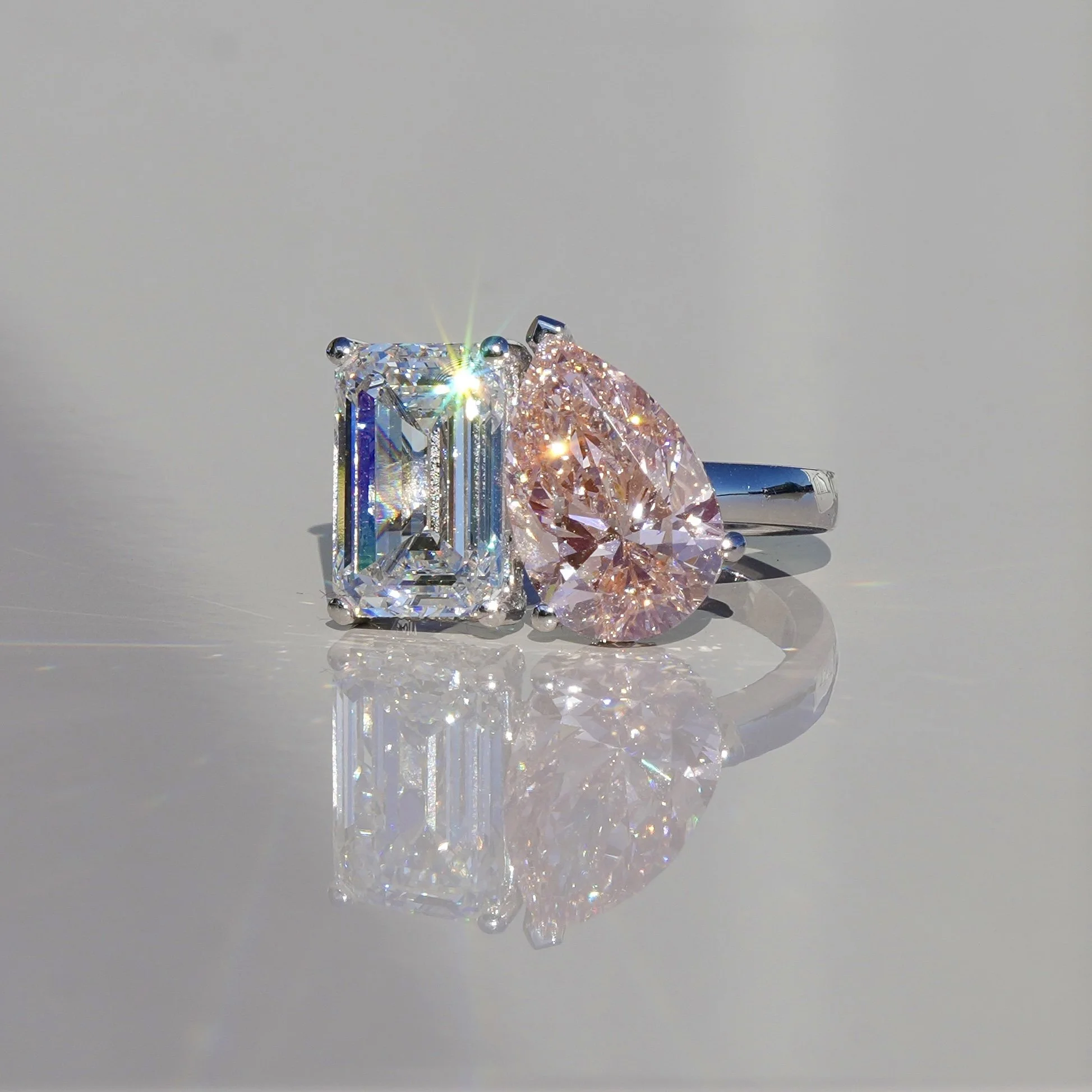 Toi et Moi Ring with 3.5ct Fancy Vivid Pink Pear Cut Diamond and 4.0ct Emerald Cut Diamond with Hidden Halo in Platinum, Total Carat Weight 7.70ct – Box View | Eighty8Diamonds