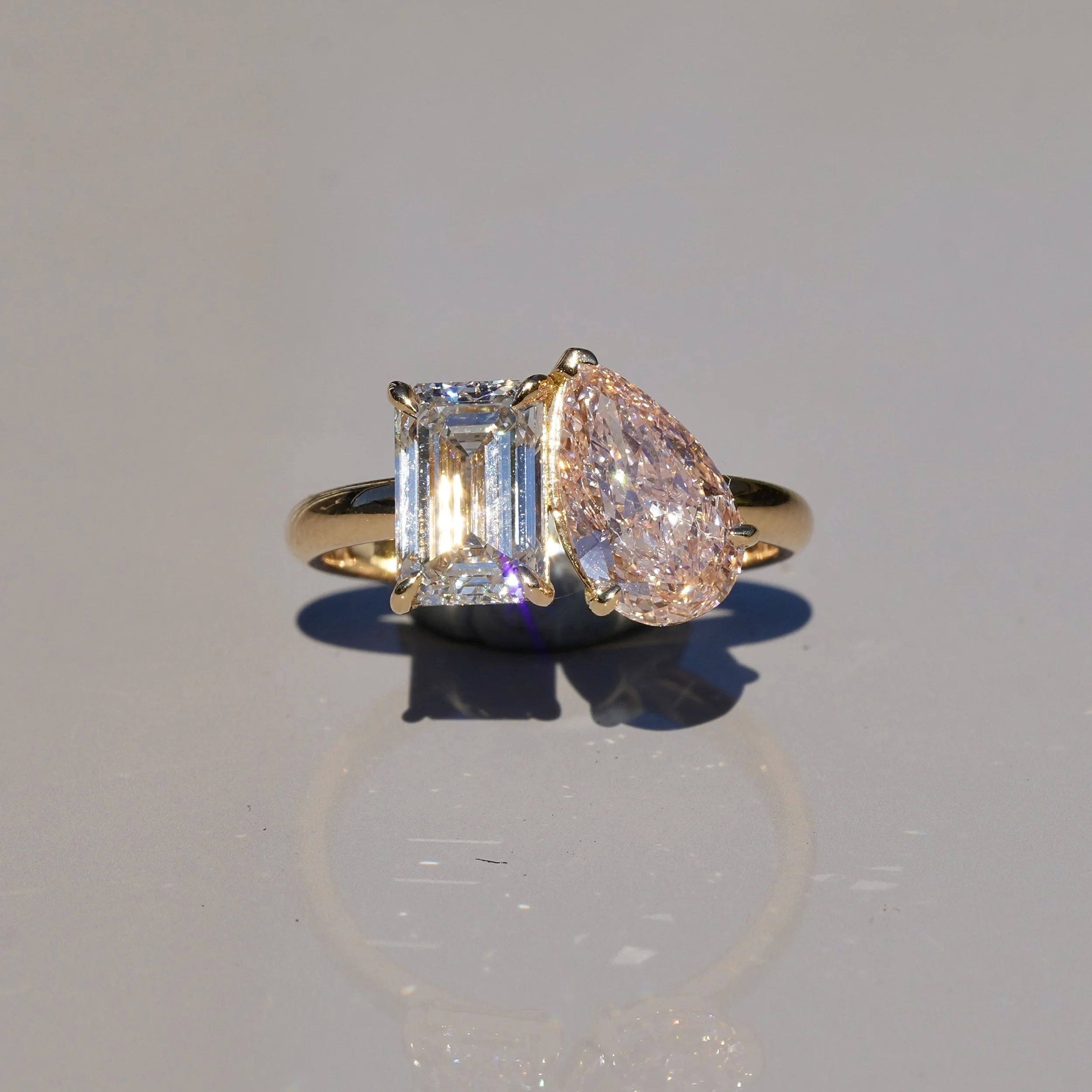 Toi et Moi Ring with 1.5ct Fancy Intense Pink Pear Cut Diamond and 1.5ct Emerald Cut Diamond in 18ct Yellow Gold, Total Carat Weight 3ct – Box View | Eighty8Diamonds