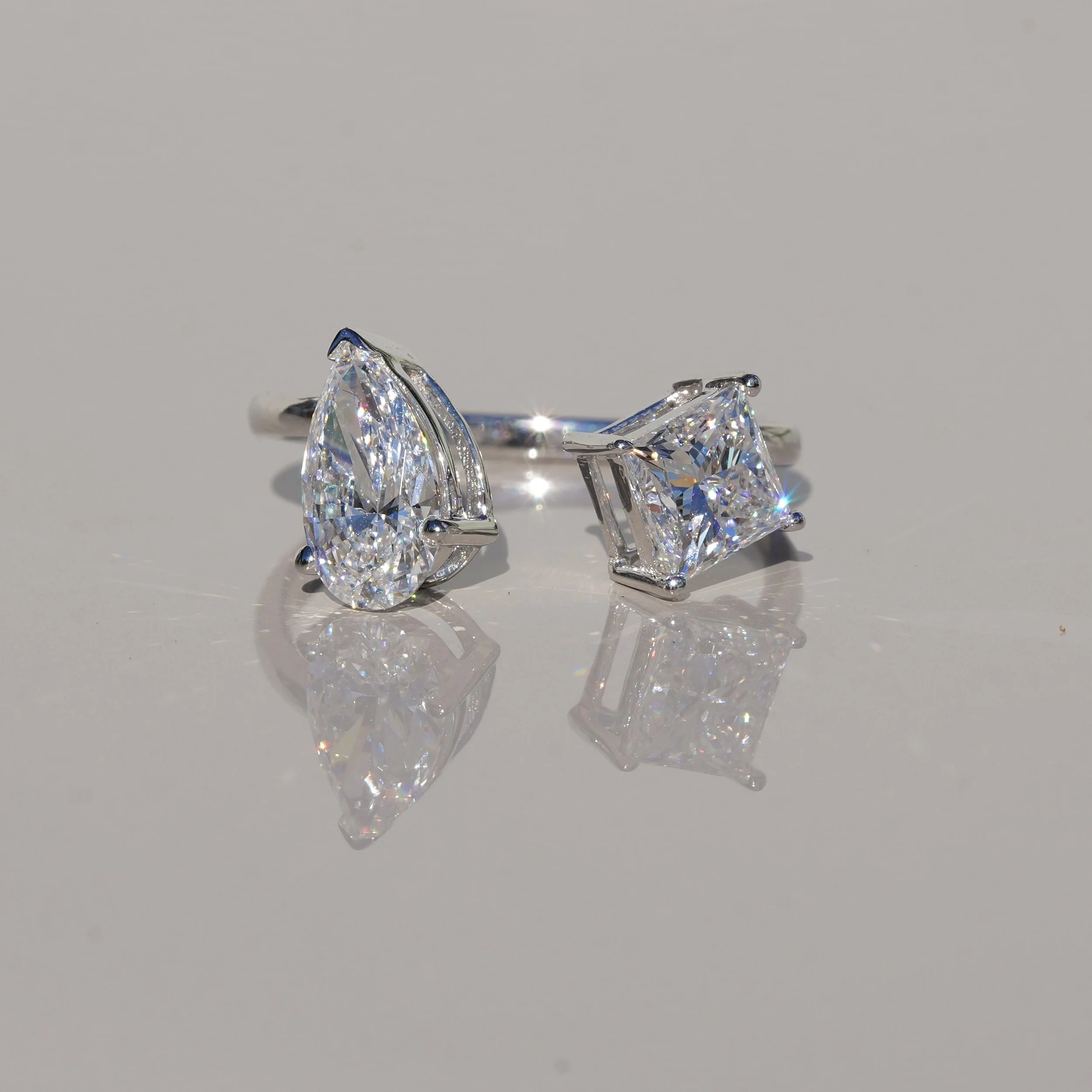 Toi et Moi Ring with 0.80ct Princess Cut Diamond and 0.80ct Pear Cut Diamond in 18ct White Gold, Total Carat Weight 1.60ct – Front View | Eighty8Diamonds