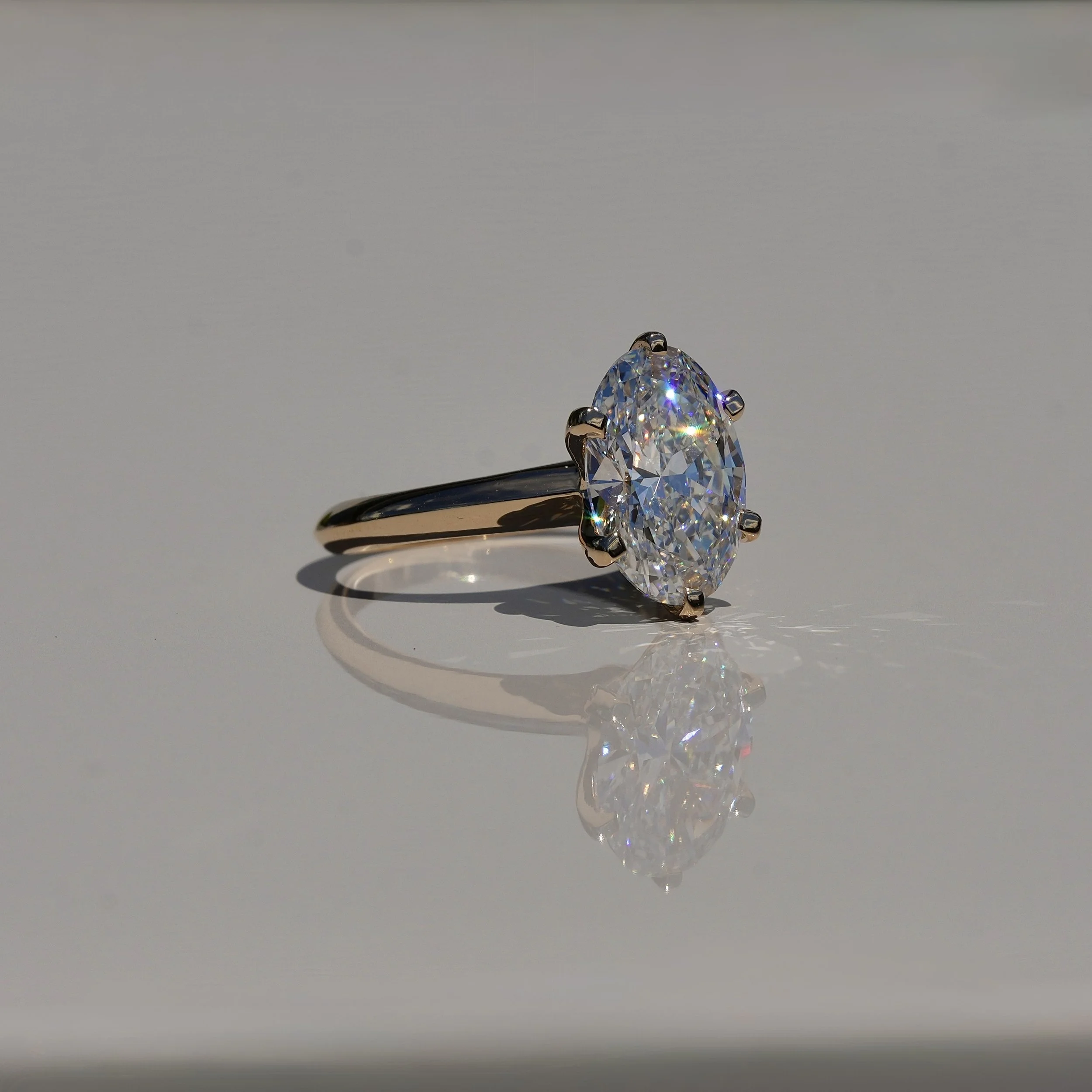 3ct Oval Cut Diamond Engagement Ring  Flower Setting in 18ct Yellow Gold - Side View |