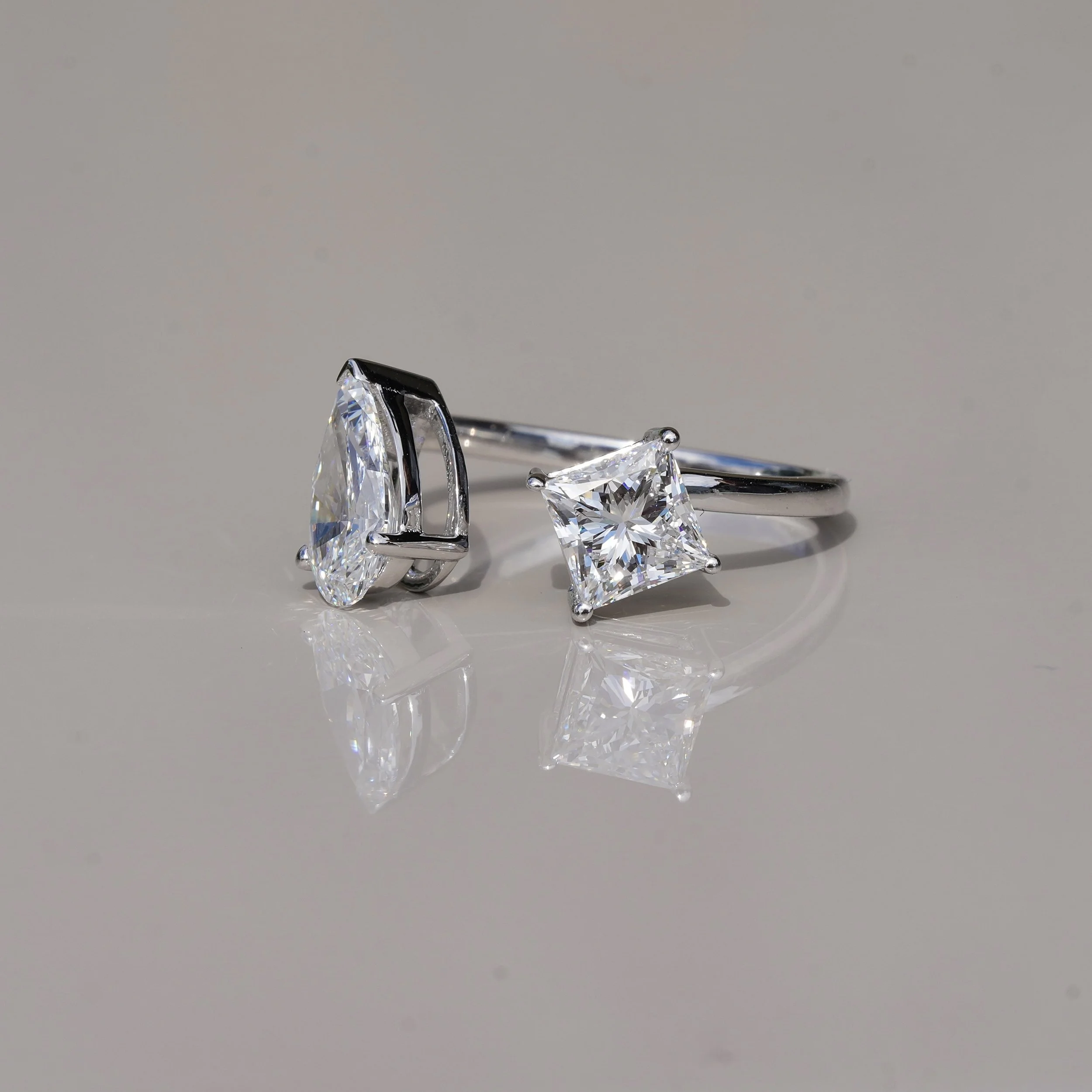 Toi et Moi Ring with 0.80ct Princess Cut Diamond and 0.80ct Pear Cut Diamond in 18ct White Gold, Total Carat Weight 1.60ct – Side View | Eighty8Diamonds