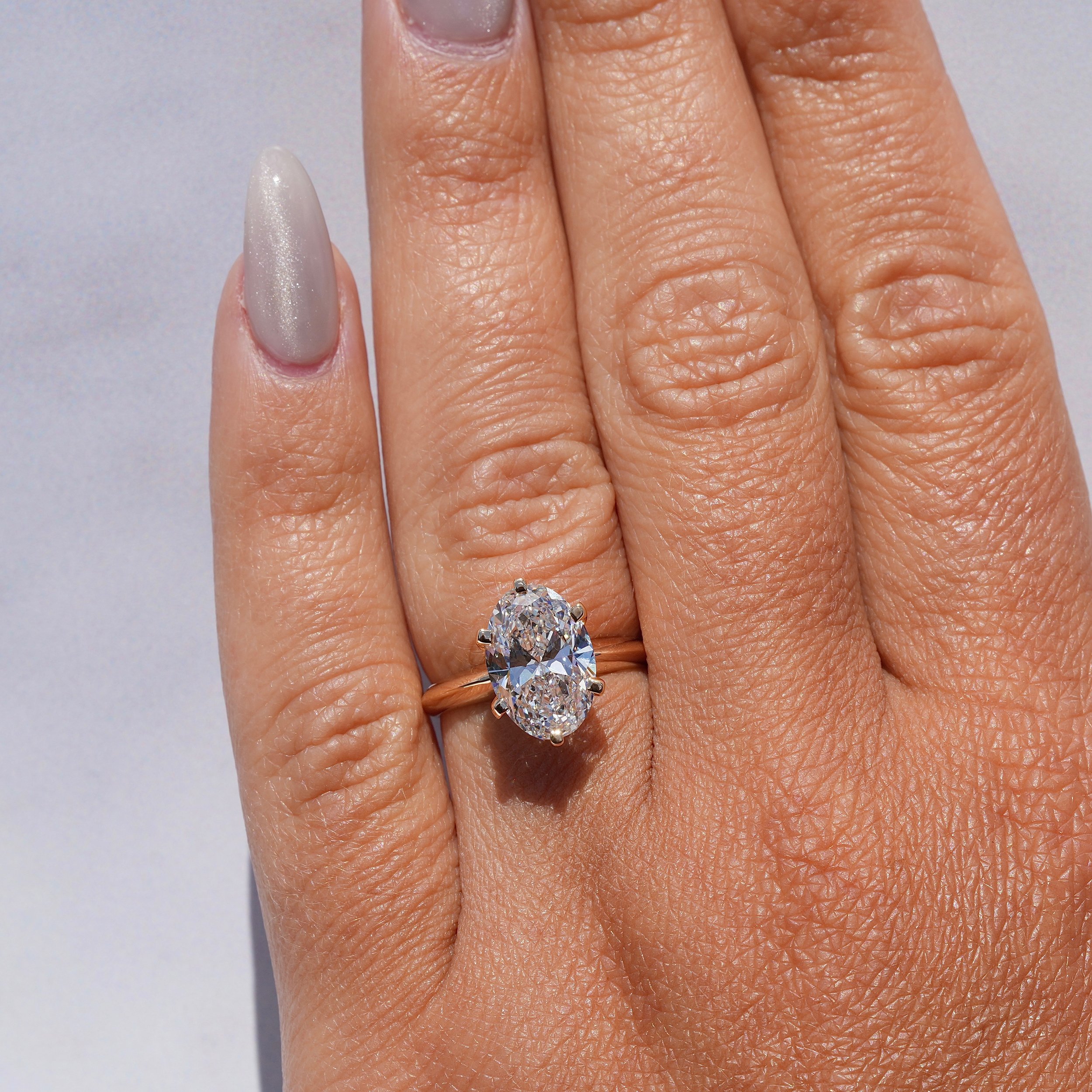 3ct Oval Cut Diamond Engagement Ring  Flower Setting in 18ct Yellow Gold - Hand View |