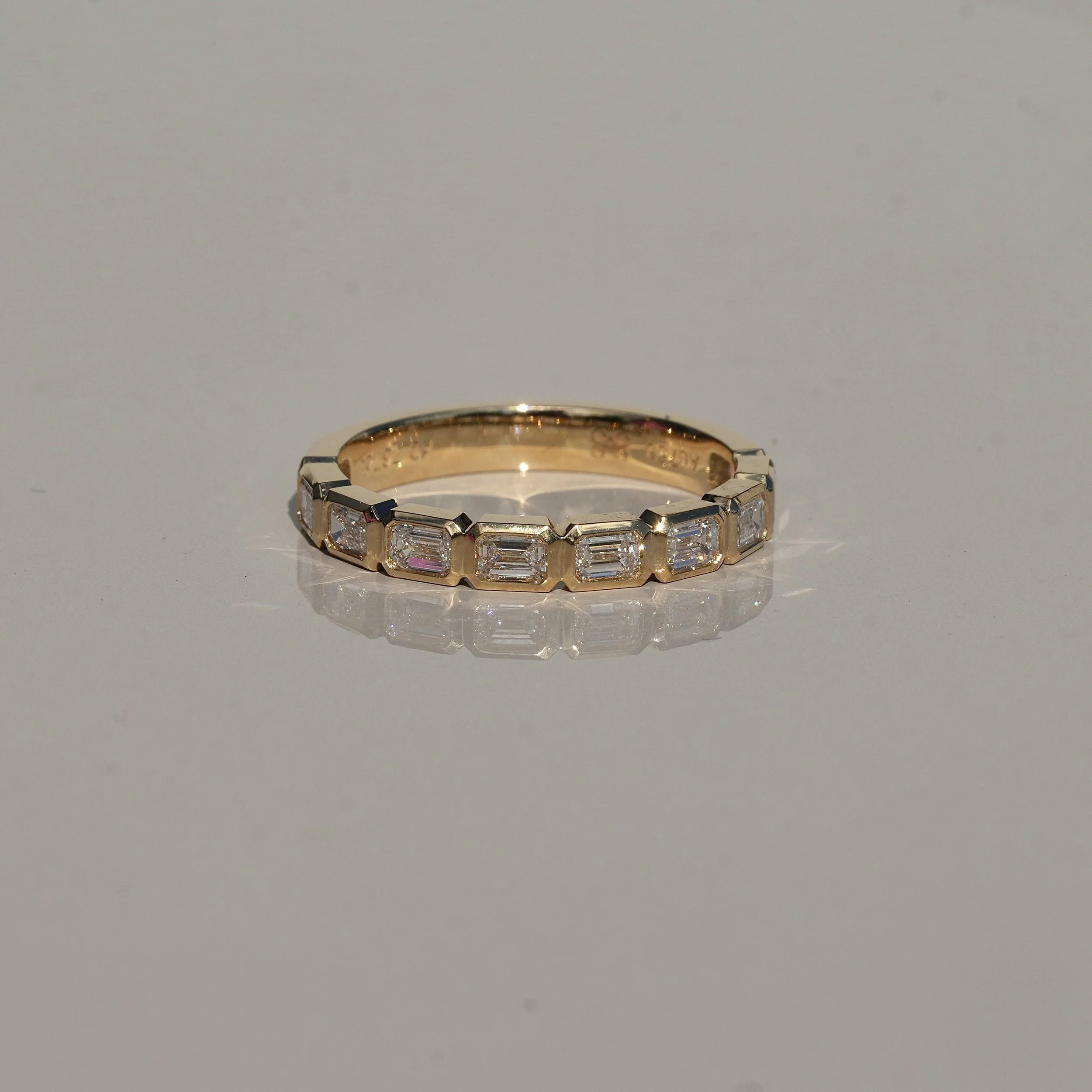 Emerald Cut Diamond Bezel Setting Half Eternity Band | 18K Yellow Gold