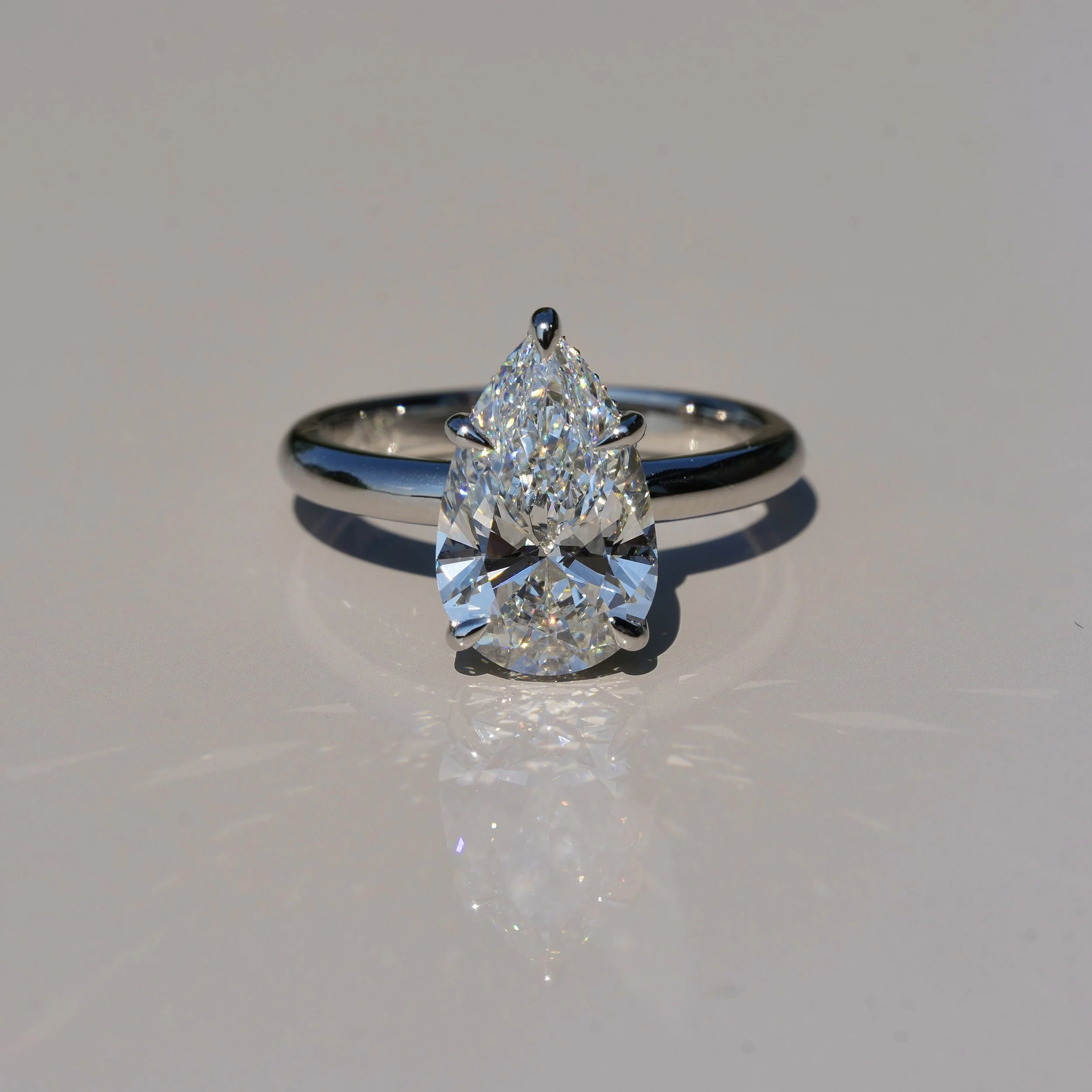 3ct Pear Cut Diamond Hidden Halo Ring in Platinum – IGI Certified – Box View | Eighty8Diamonds