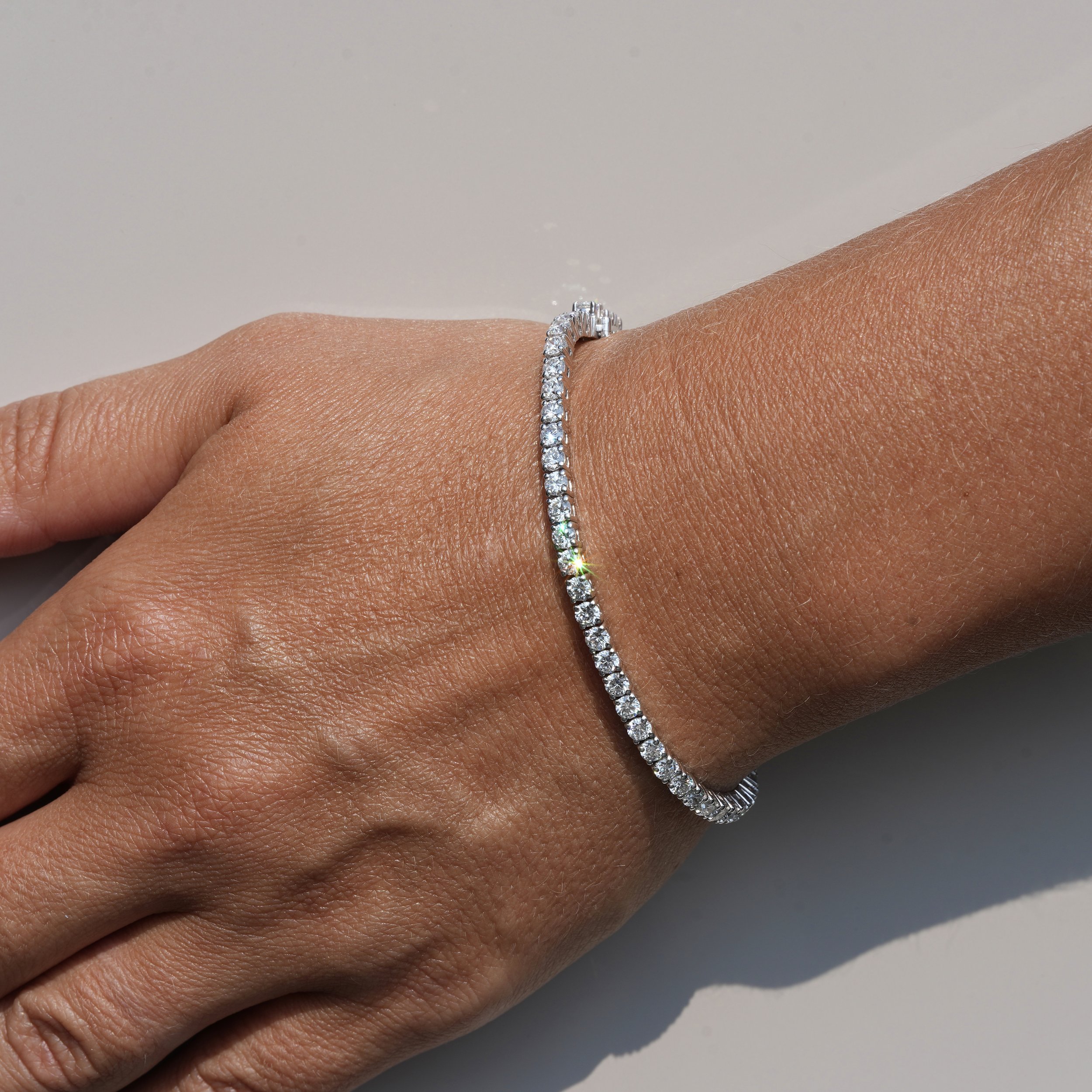 Women’s Tennis Bracelet with 5ct  Diamonds in 14K White Gold – Hand View | Eighty8Diamonds