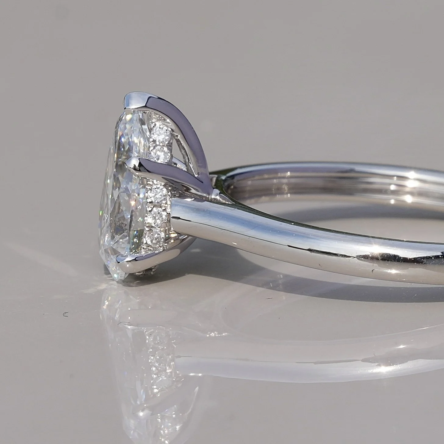 1ct Pear Cut Diamond Hidden Halo Ring in Platinum – IGI Certified – Angeled View | Eighty8Diamonds