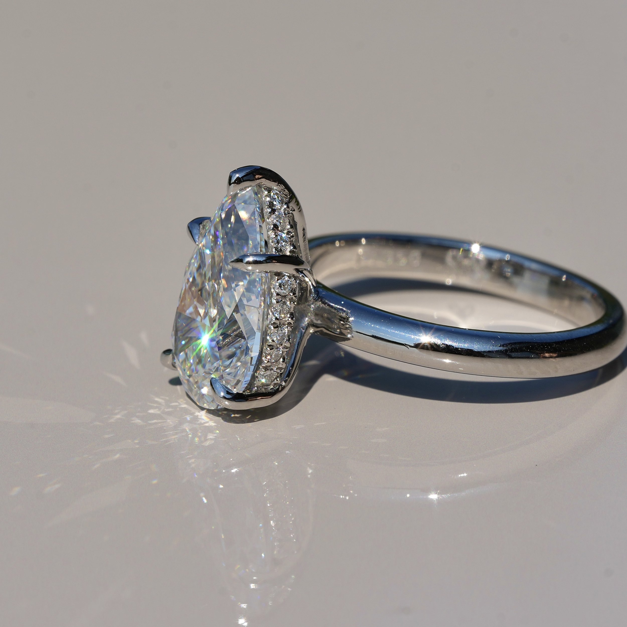3ct Pear Cut Diamond Hidden Halo Ring in Platinum – IGI Certified – Side View | Eighty8Diamonds
