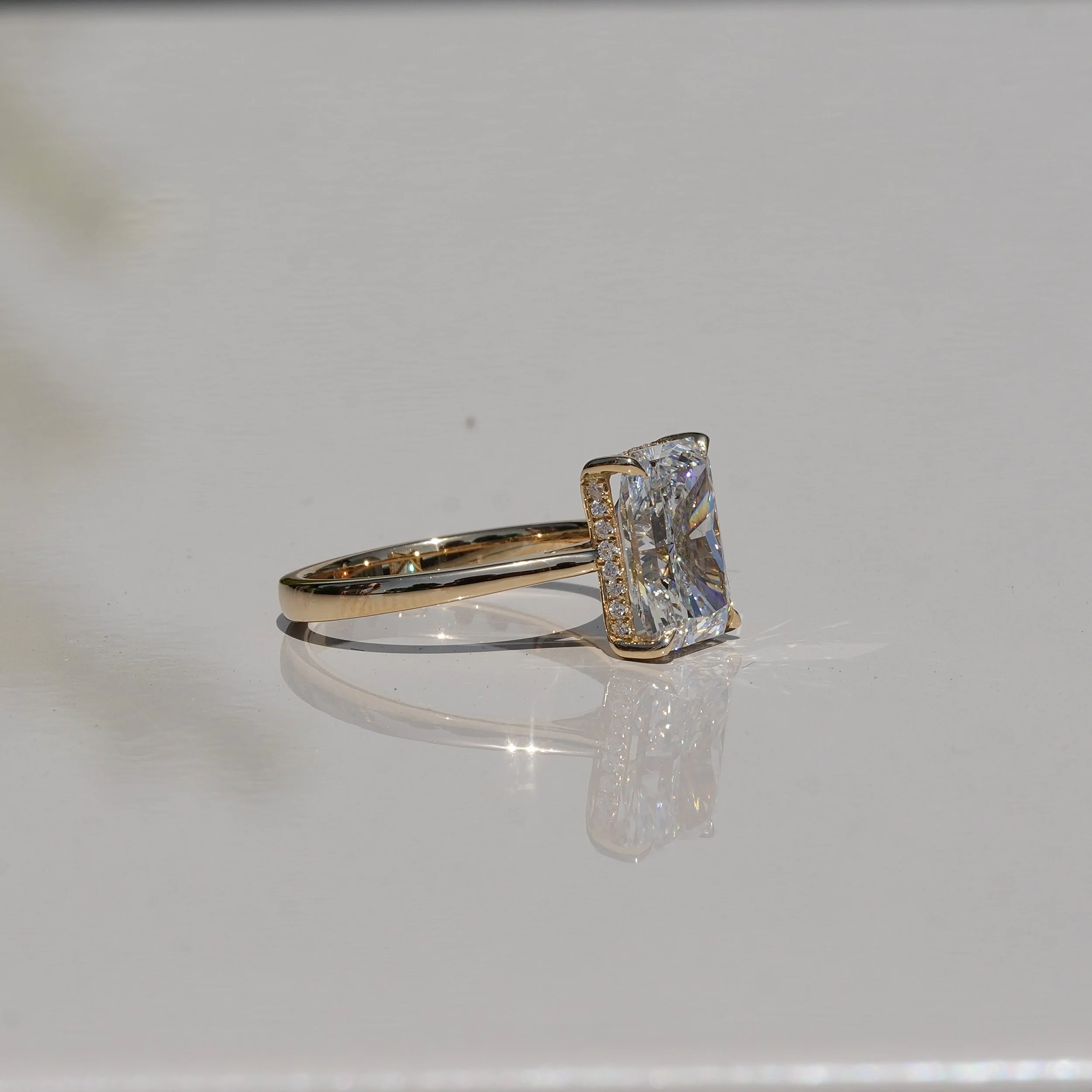 3ct Radiant Cut Diamond Solitaire Engagement Ring with Hidden Halo  in 18ct Yellow Gold –Side View | Eighty8Diamonds